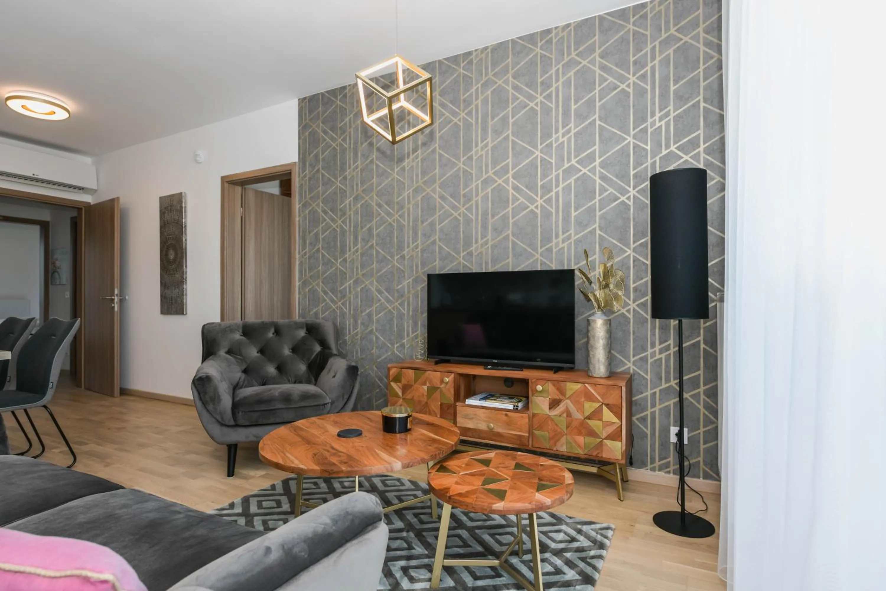 Communal lounge/ TV room in Elisabeth Downtown Apartments by FirstHost