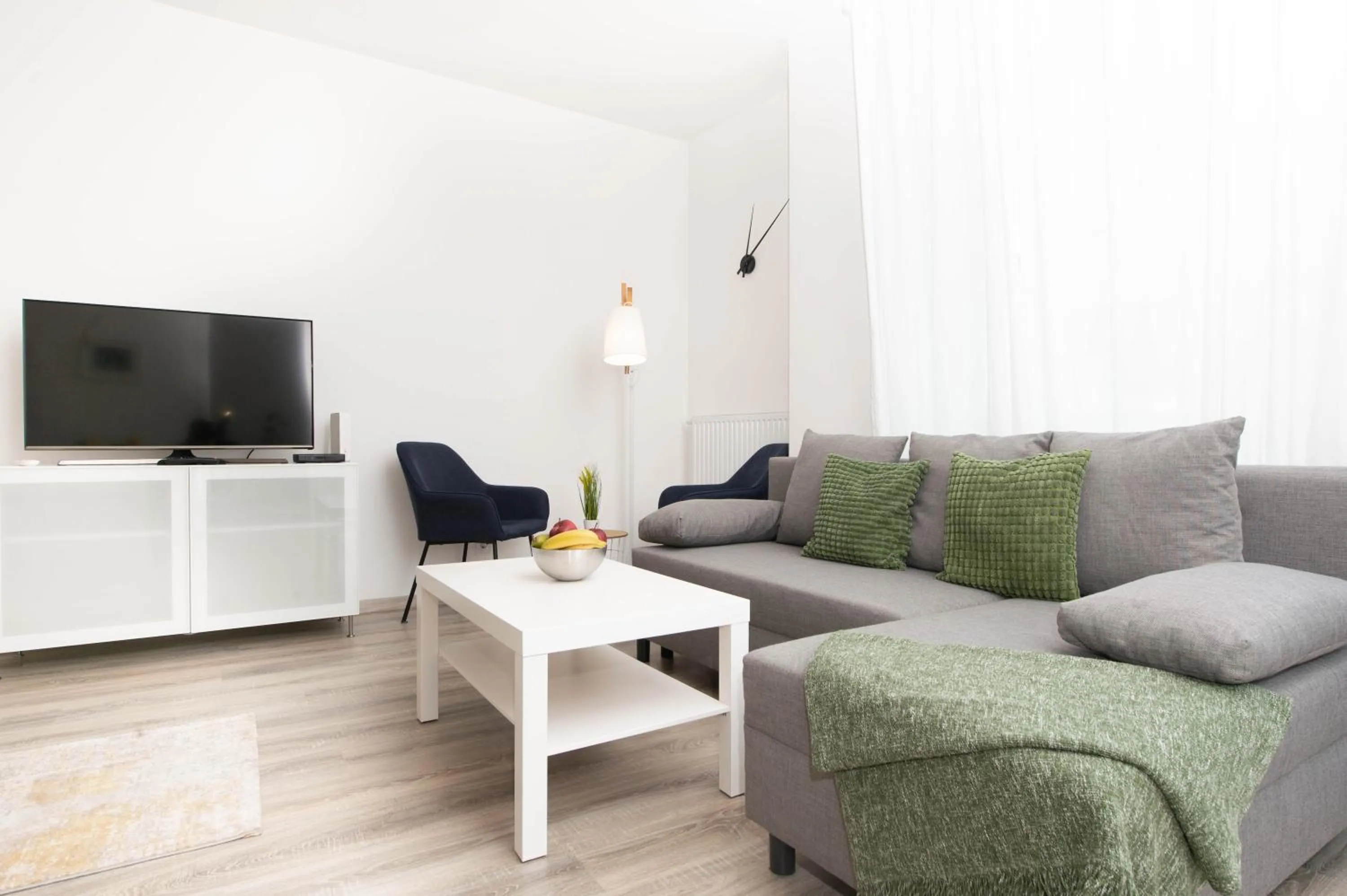 Communal lounge/ TV room in Elisabeth Downtown Apartments by FirstHost