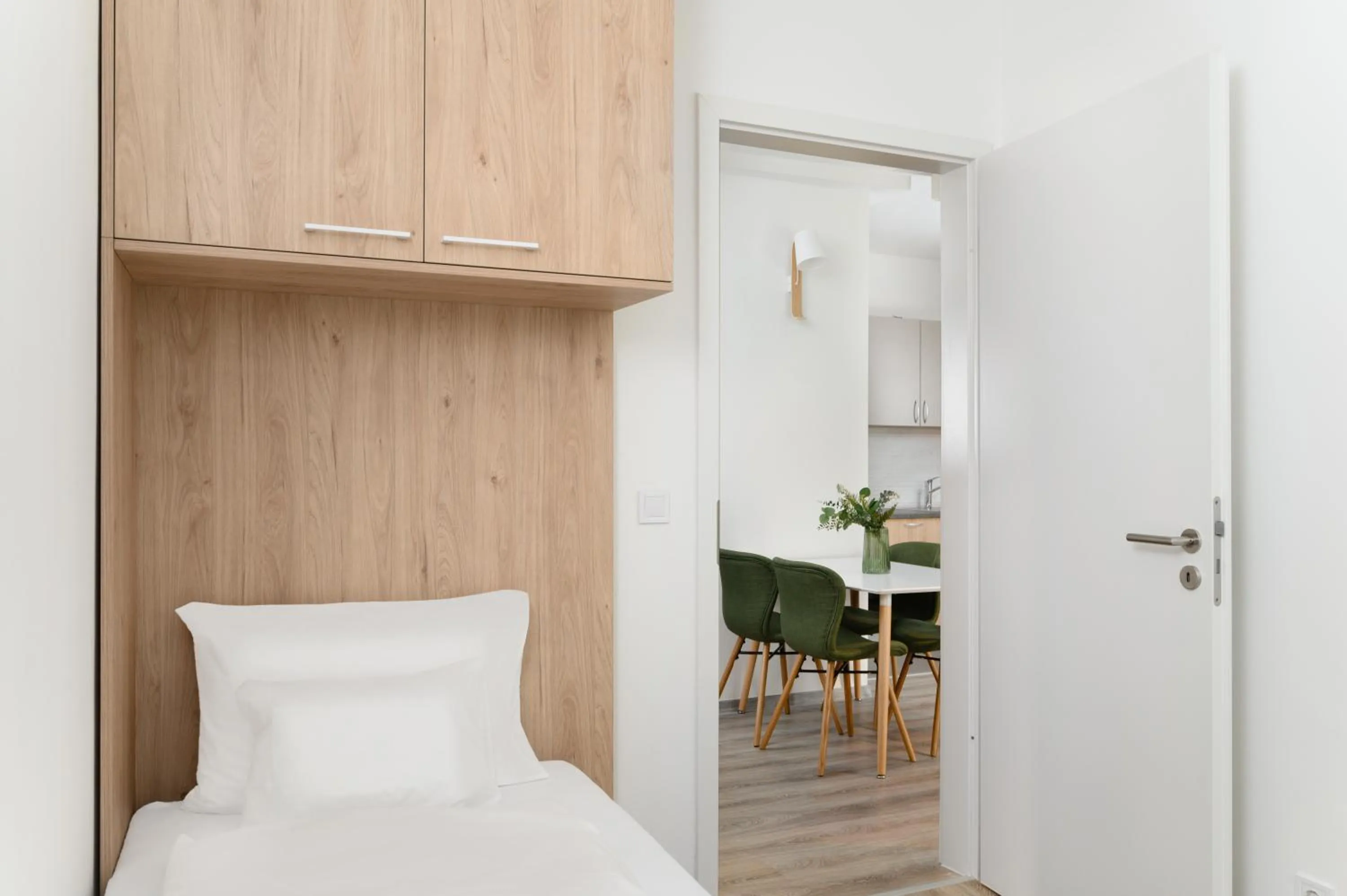 Bed in Elisabeth Downtown Apartments by FirstHost