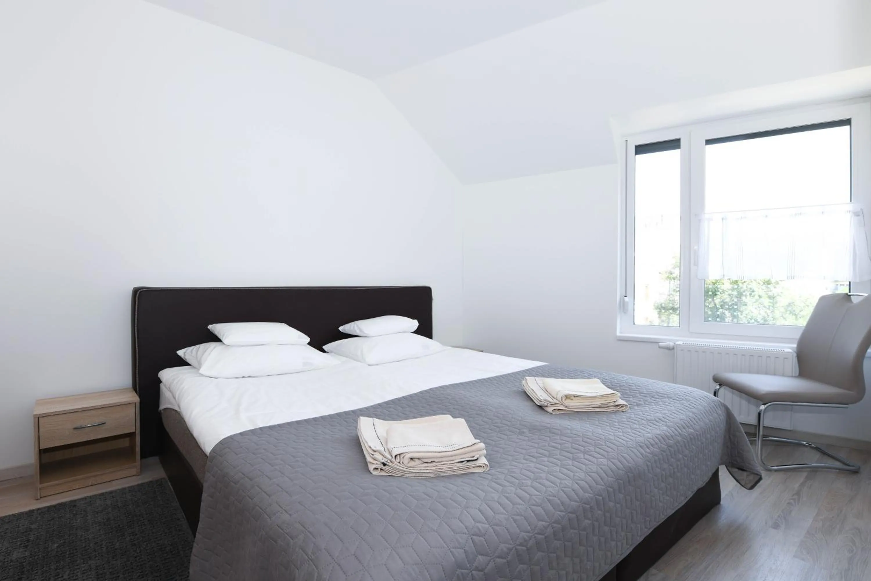 Bed in Elisabeth Downtown Apartments by FirstHost