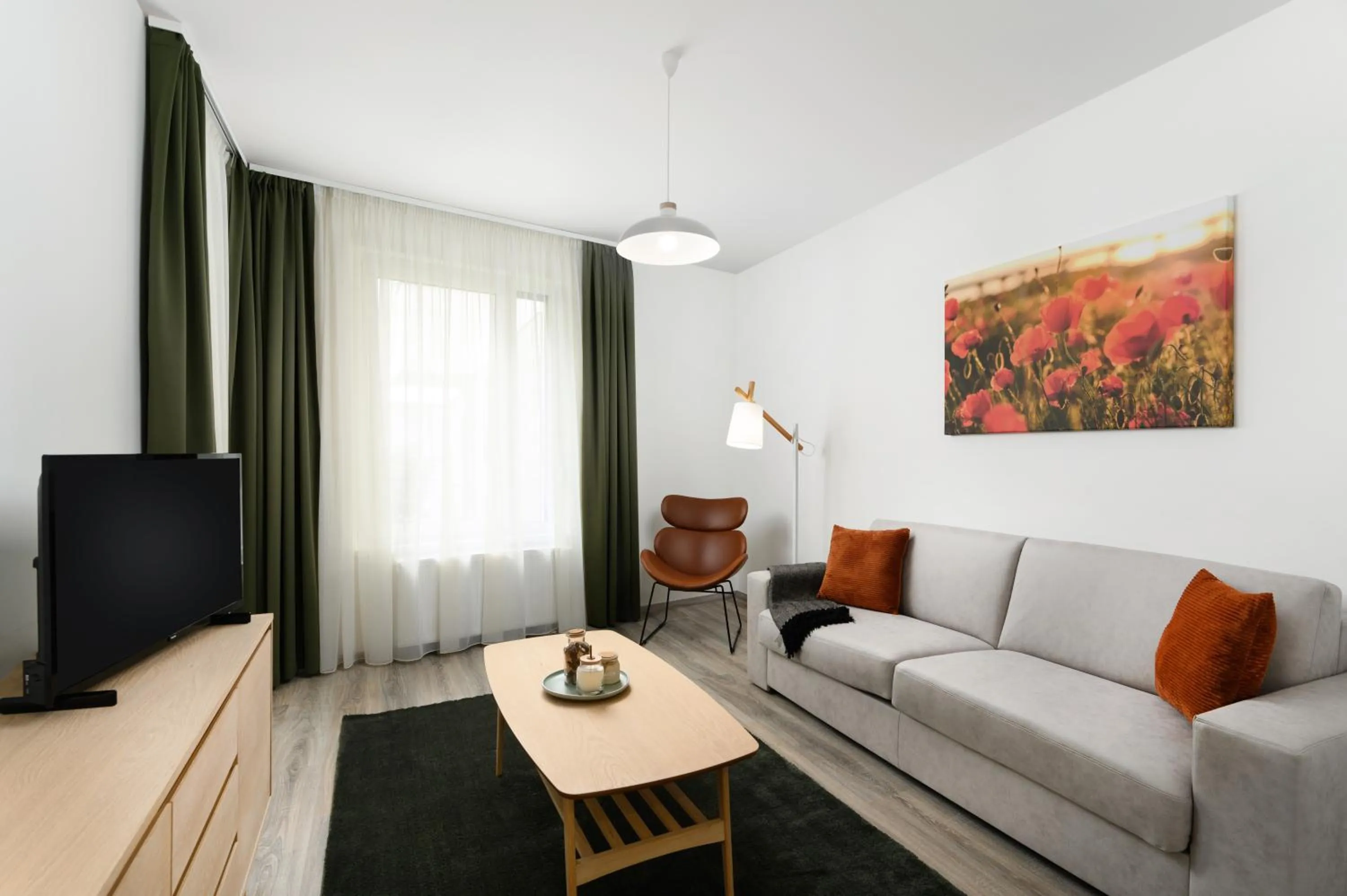 Communal lounge/ TV room in Elisabeth Downtown Apartments by FirstHost