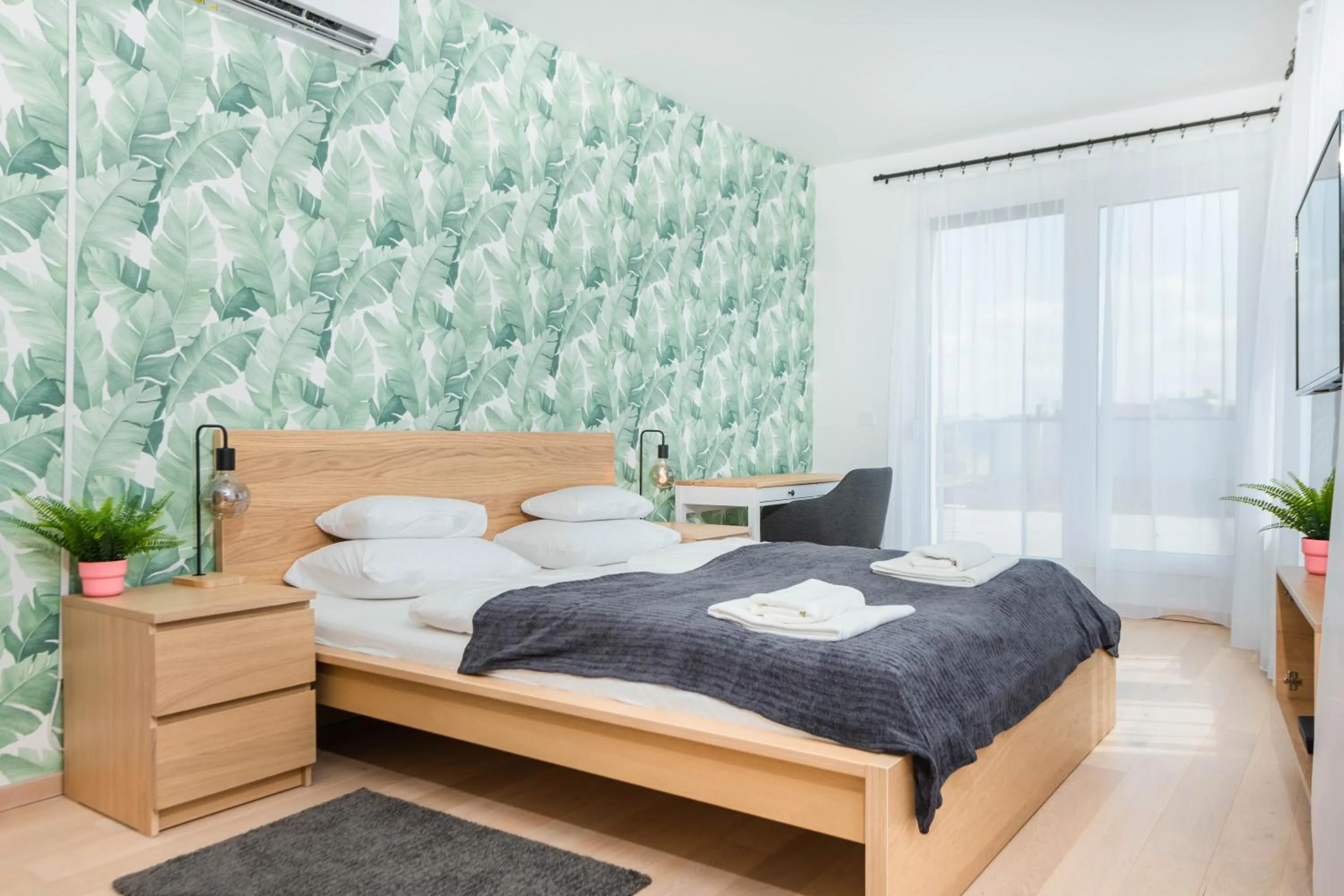 Bed in Elisabeth Downtown Apartments by FirstHost