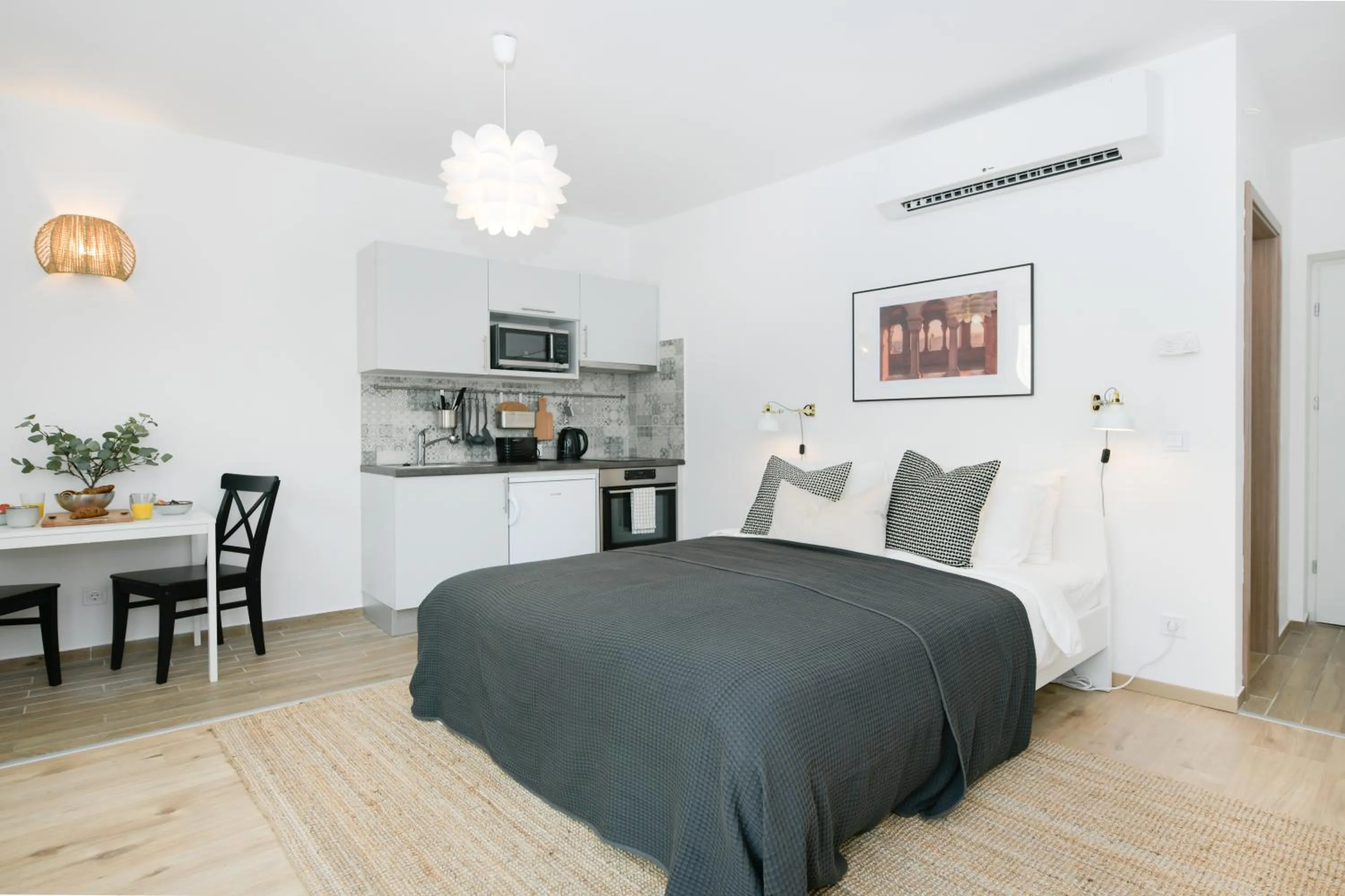 Bed in Elisabeth Downtown Apartments by FirstHost