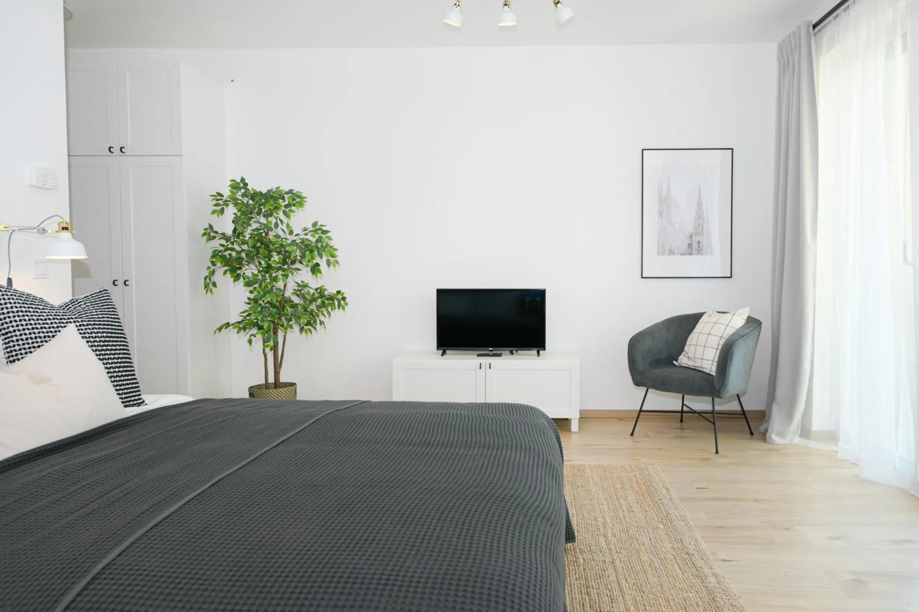 Bed in Elisabeth Downtown Apartments by FirstHost