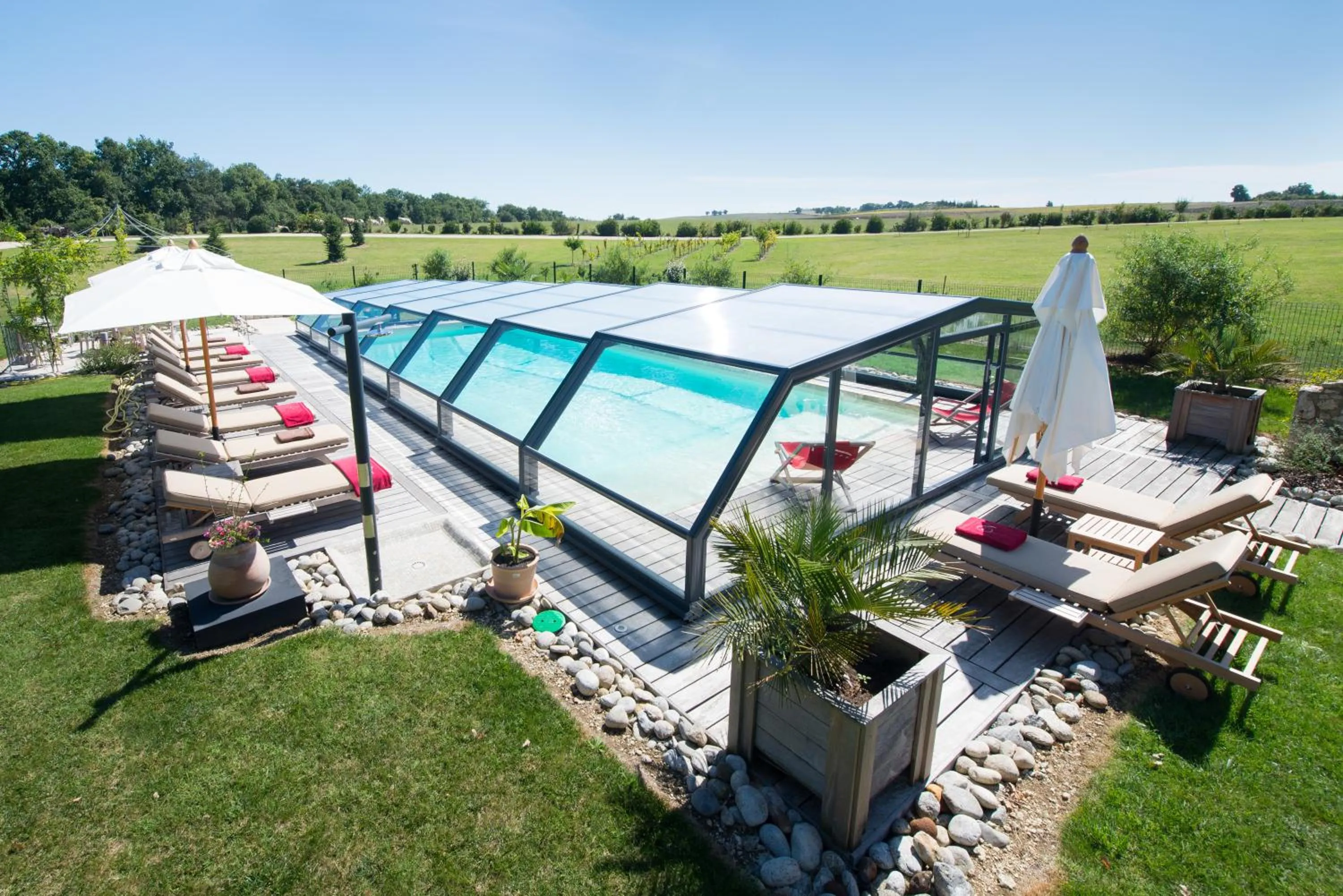 Swimming pool in Chambres d'hôtes Domaine de Nazère