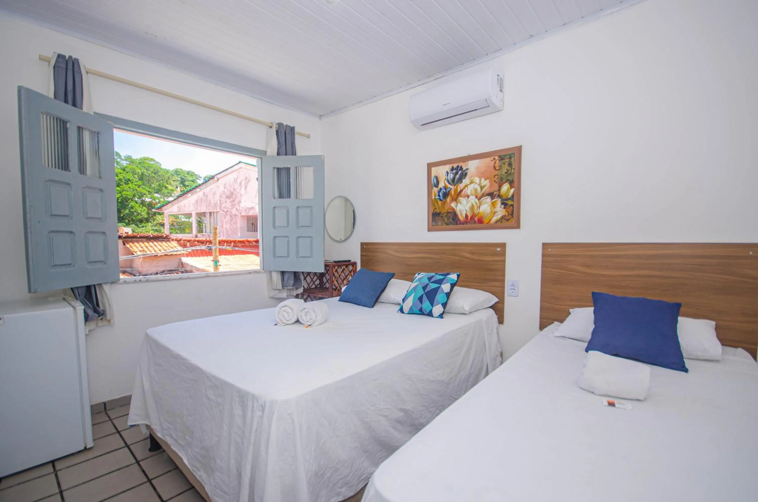 Bed in Pousada Morro Tropical