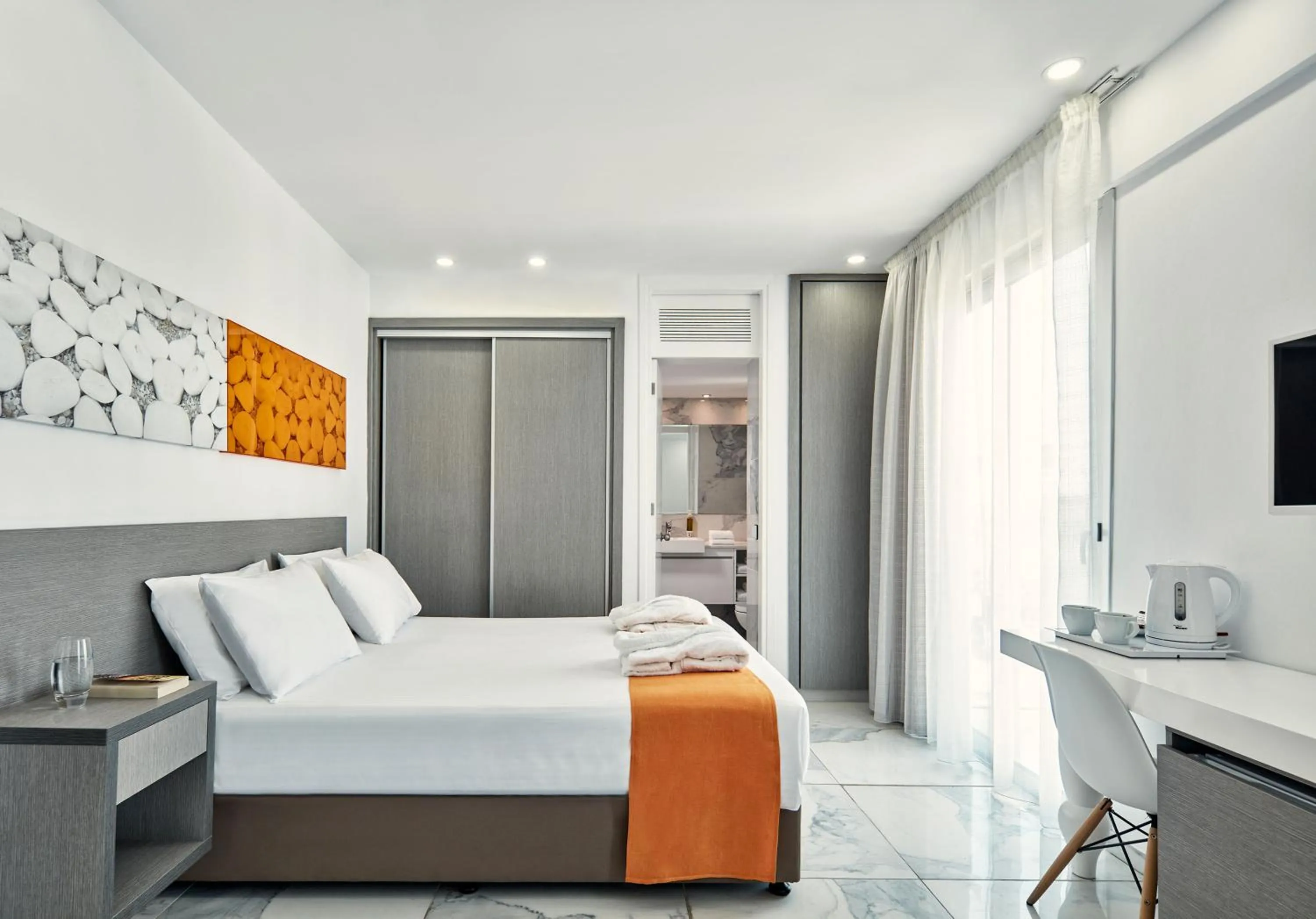 Bed in Atlantica Sancta Napa Hotel