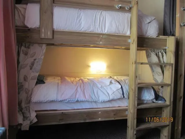 Bed in Les Fleurs Accommodation