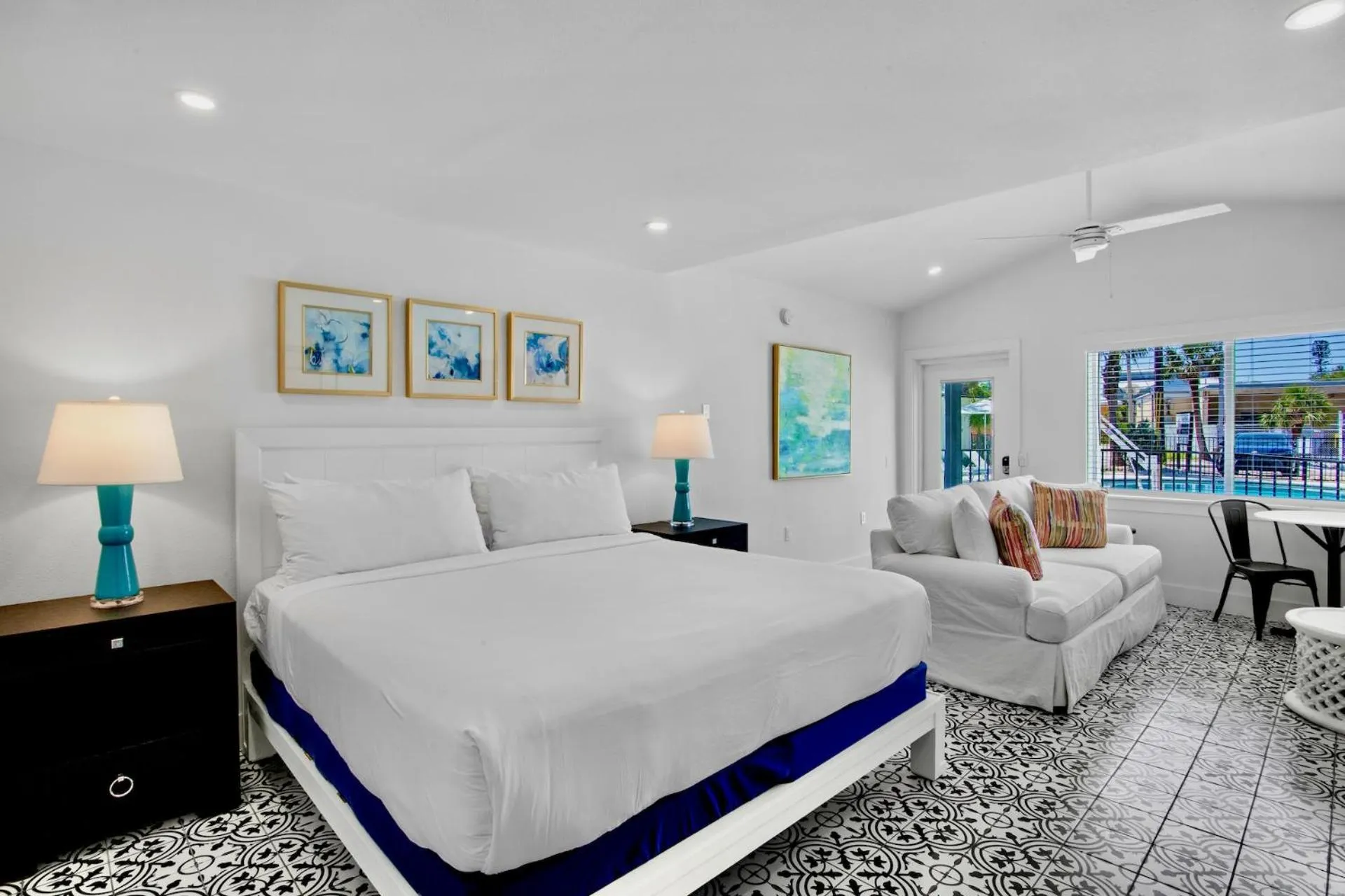 Bed in Pelican Post at Anna Maria Island Inn