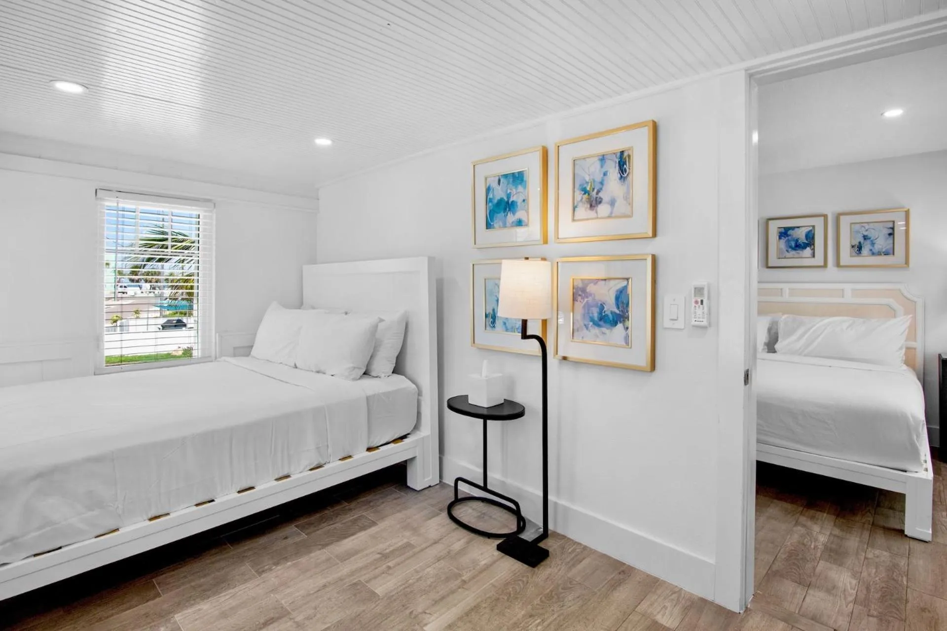 Bed in Pelican Post at Anna Maria Island Inn