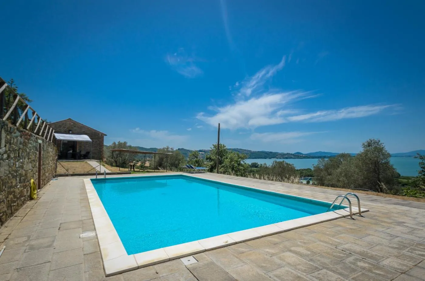 Swimming pool in PoloTuristicoUmbria Rustico con Piscina Vista Lago