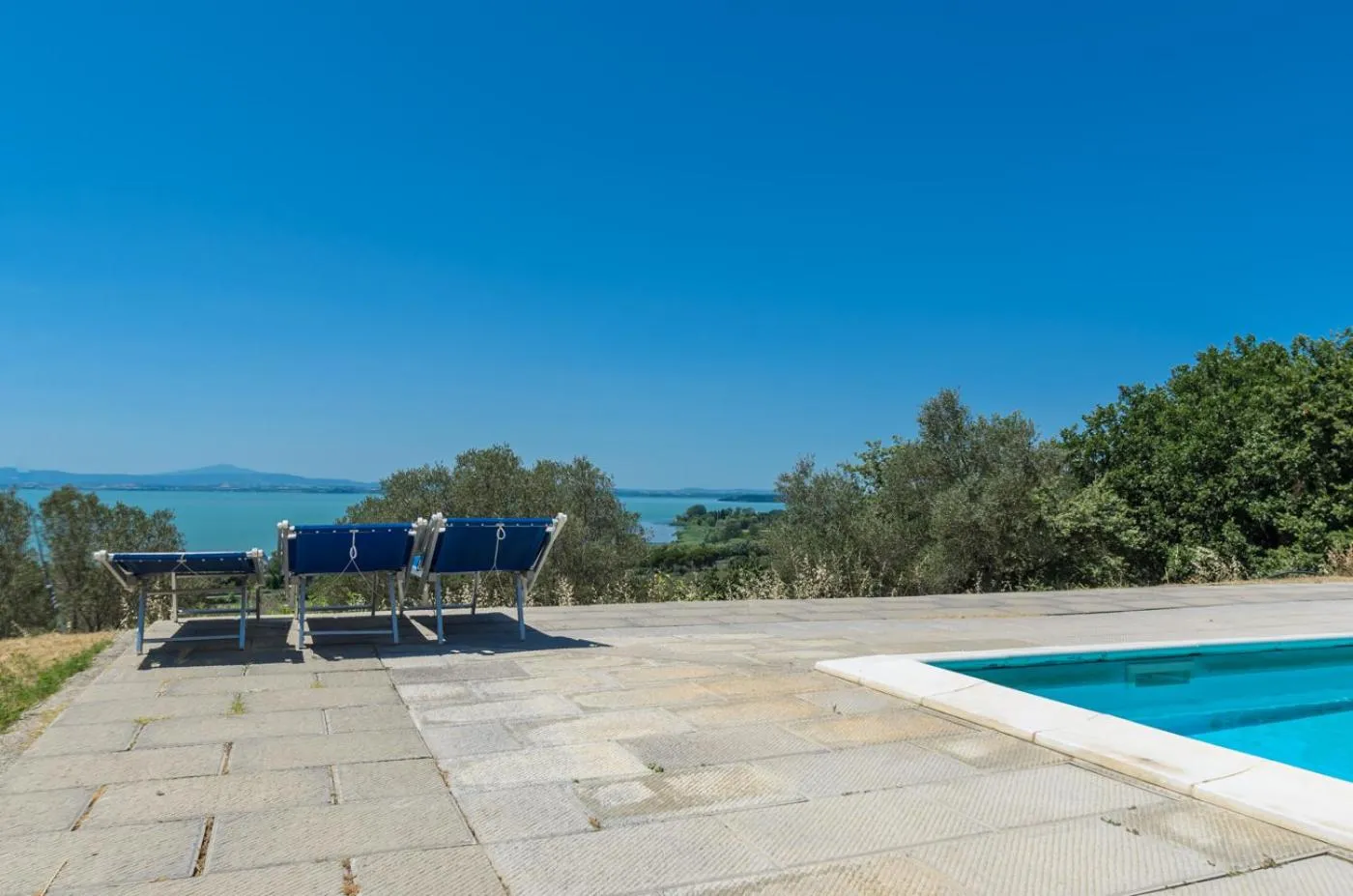 Swimming pool in PoloTuristicoUmbria Rustico con Piscina Vista Lago