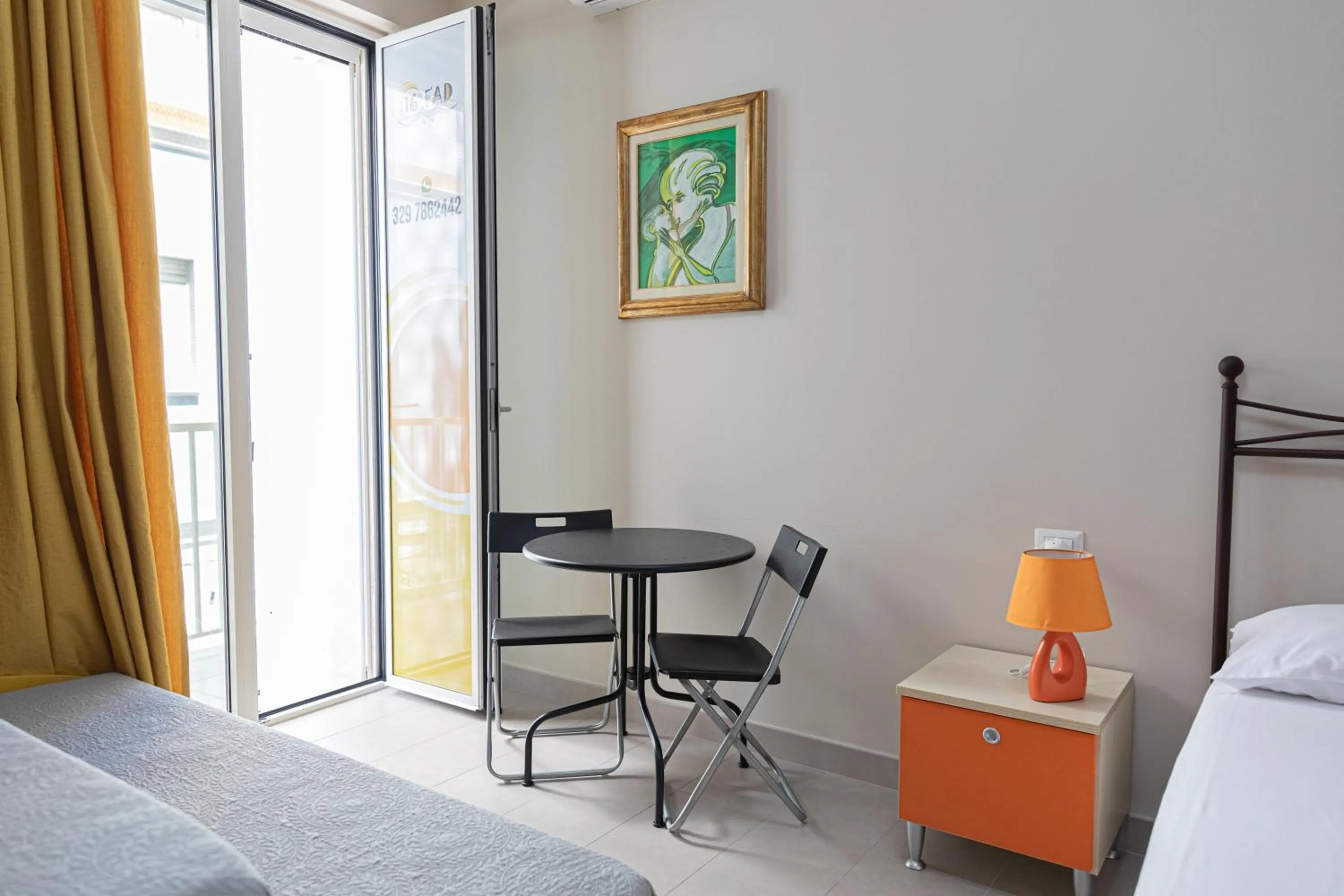 Bed in 16TH FAD ROOMS