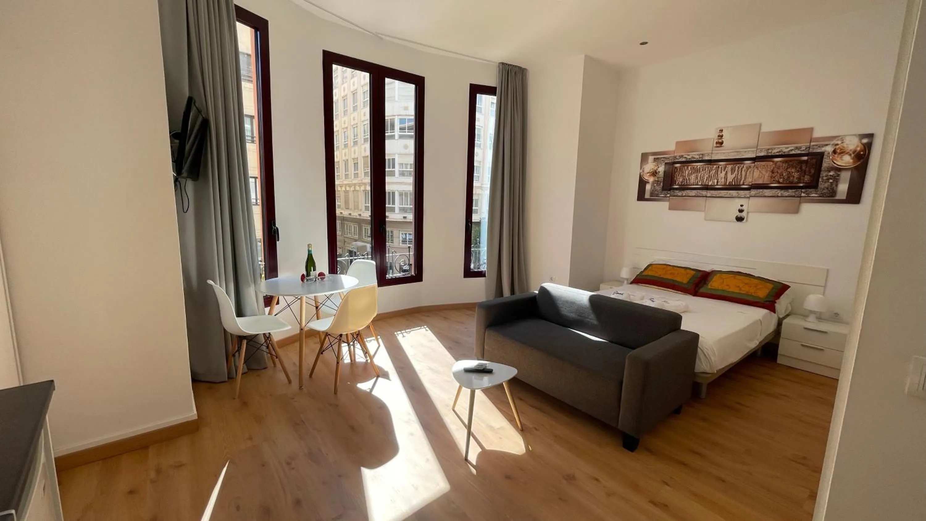 Living room, Bed in Apartamentos Boni