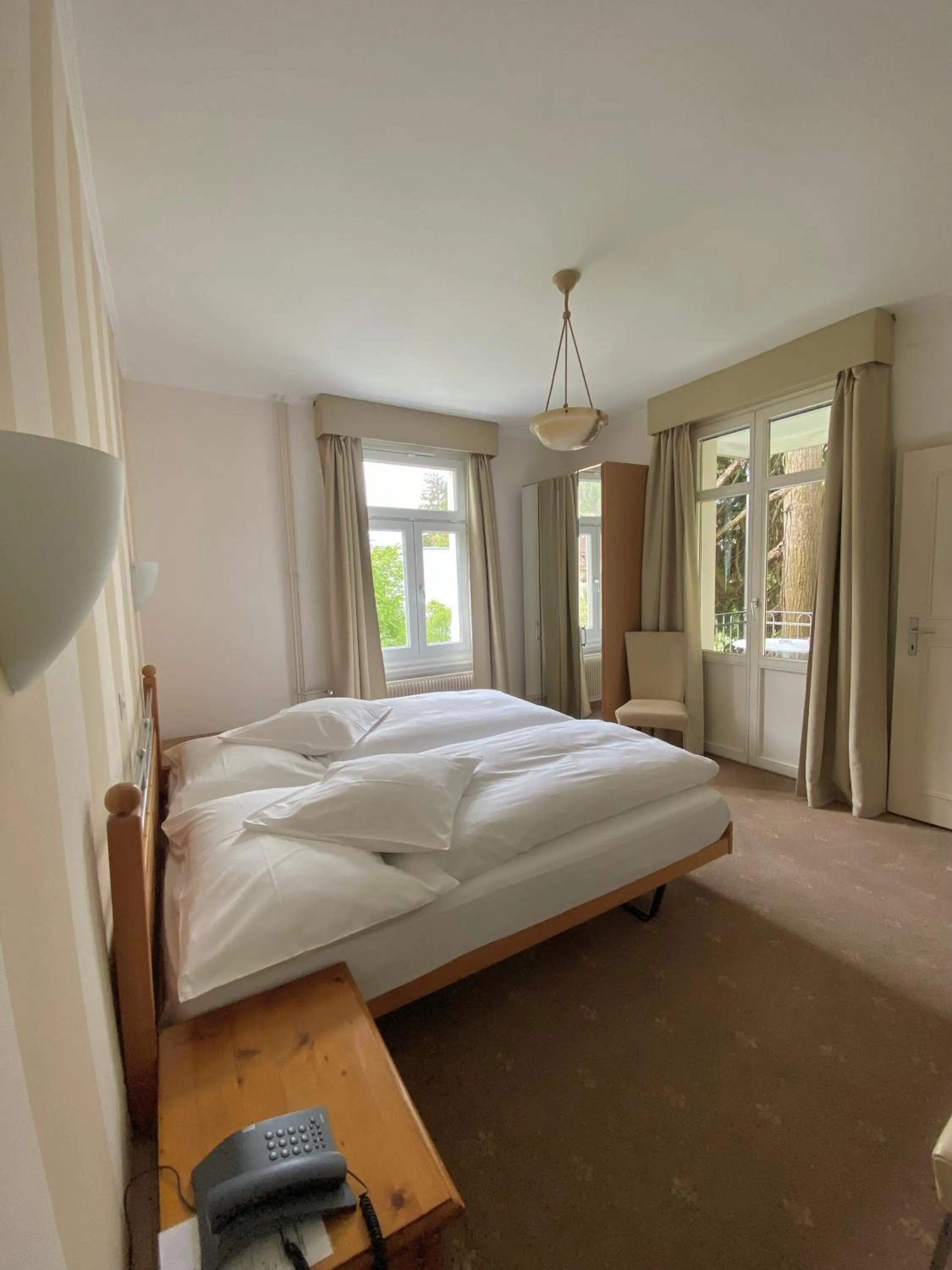 Bed in Hotel De La Paix