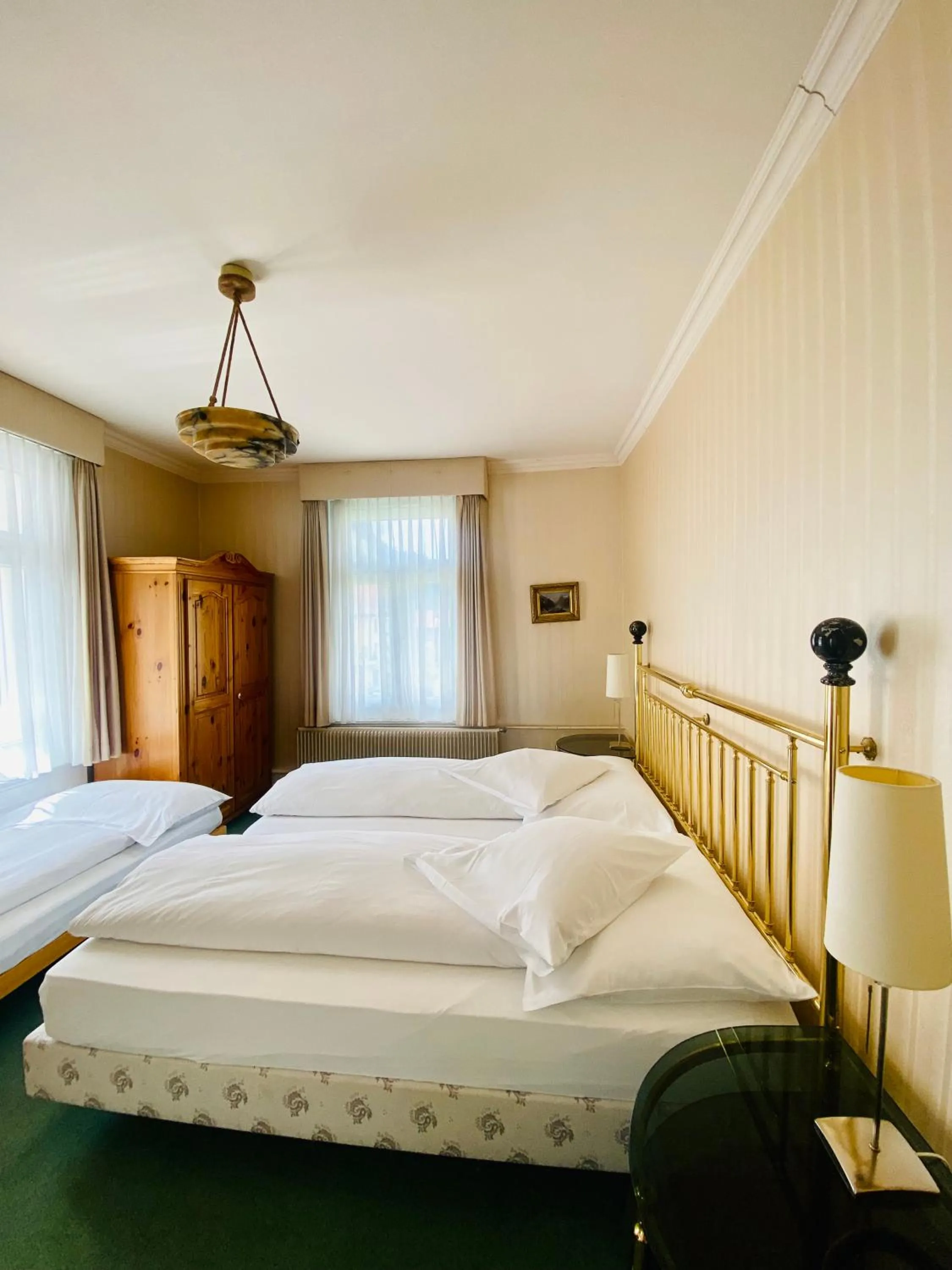 Bed in Hotel De La Paix