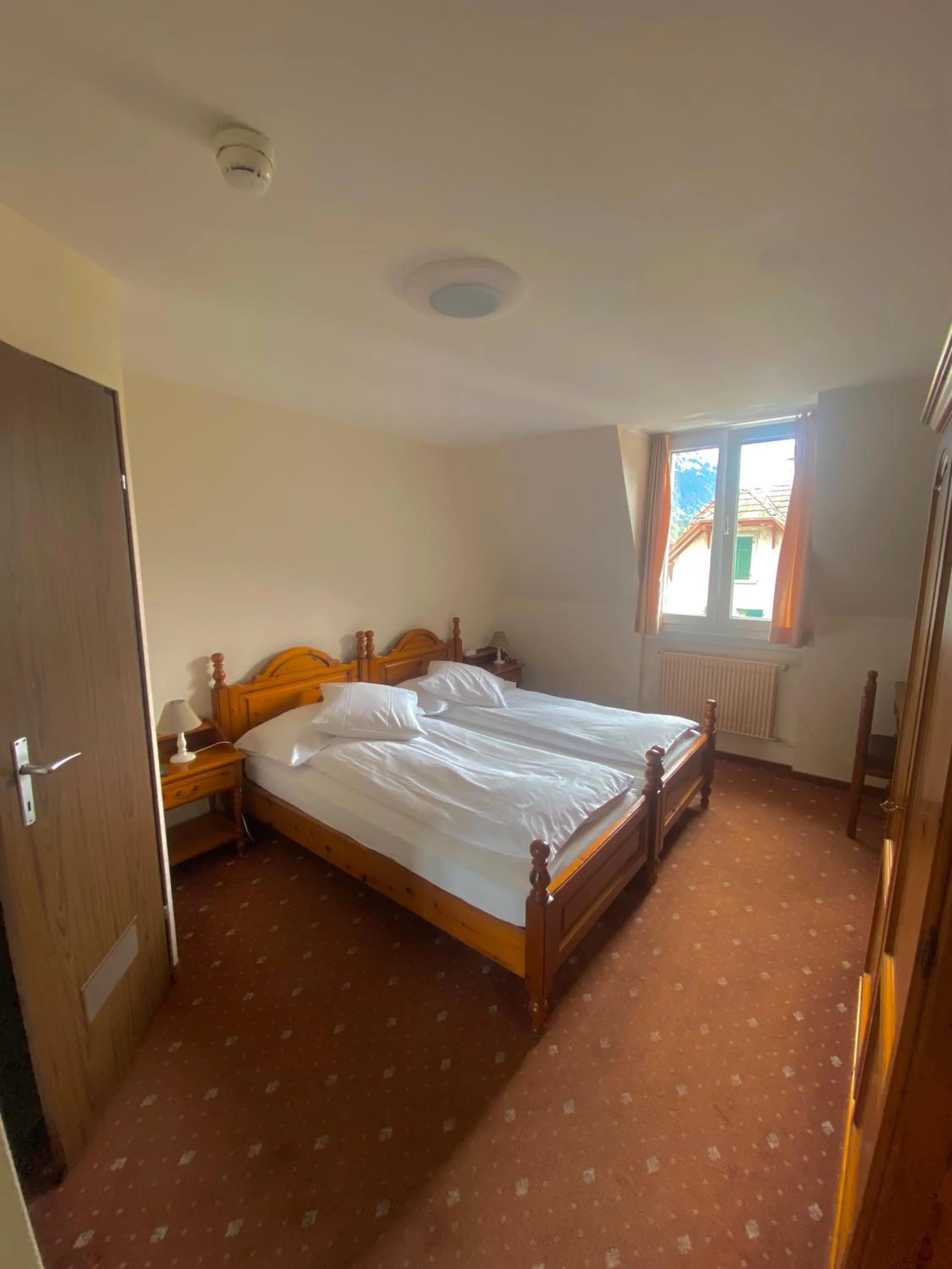 Bed in Hotel De La Paix