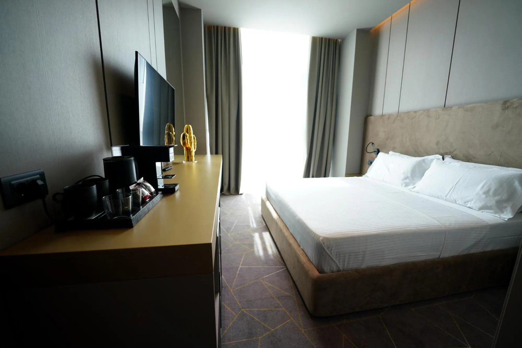 Photo of the whole room, Bed in The Central View Boutique Hotel