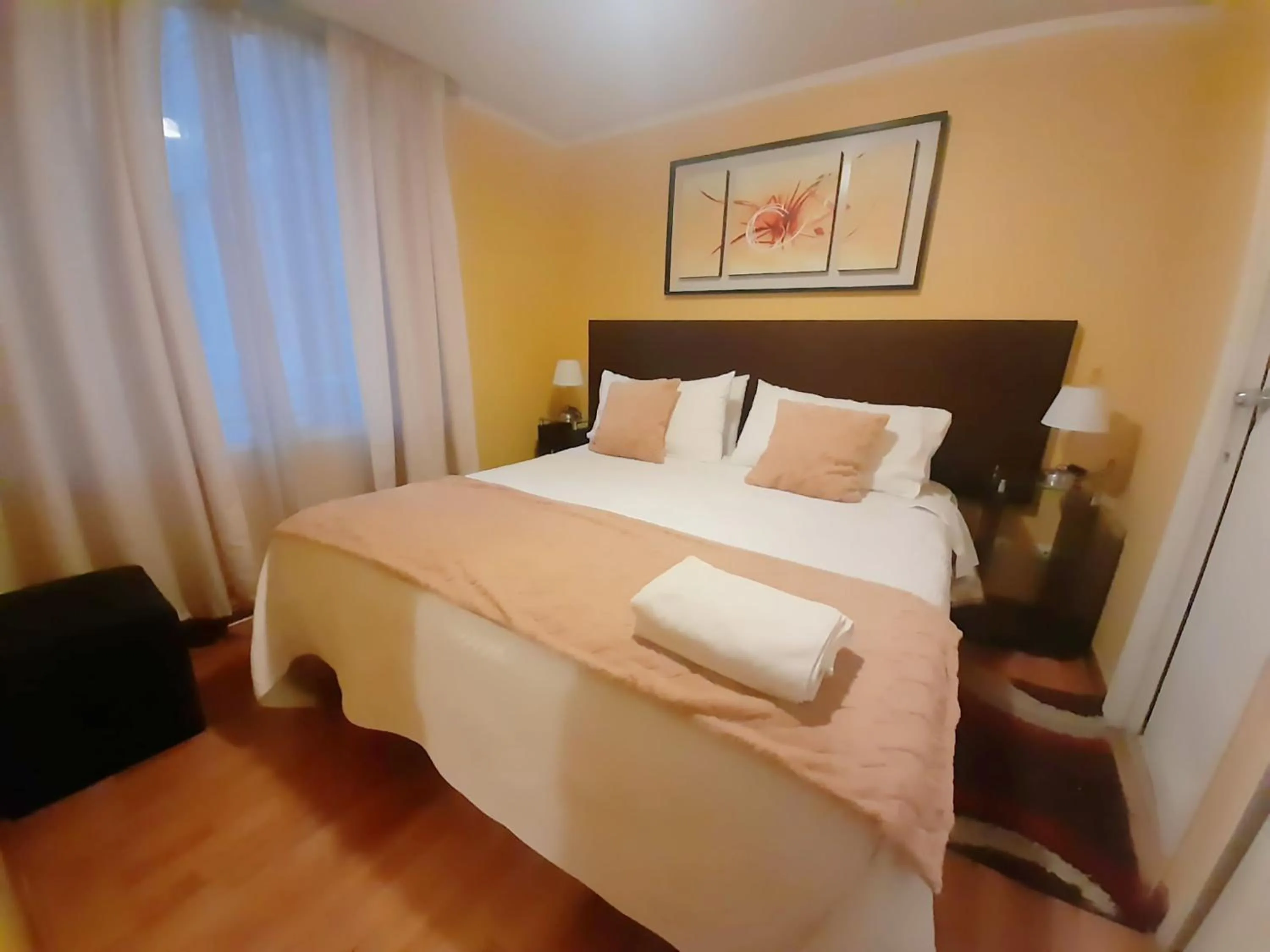 Decorative detail, Bed in VIP Apartments Chile