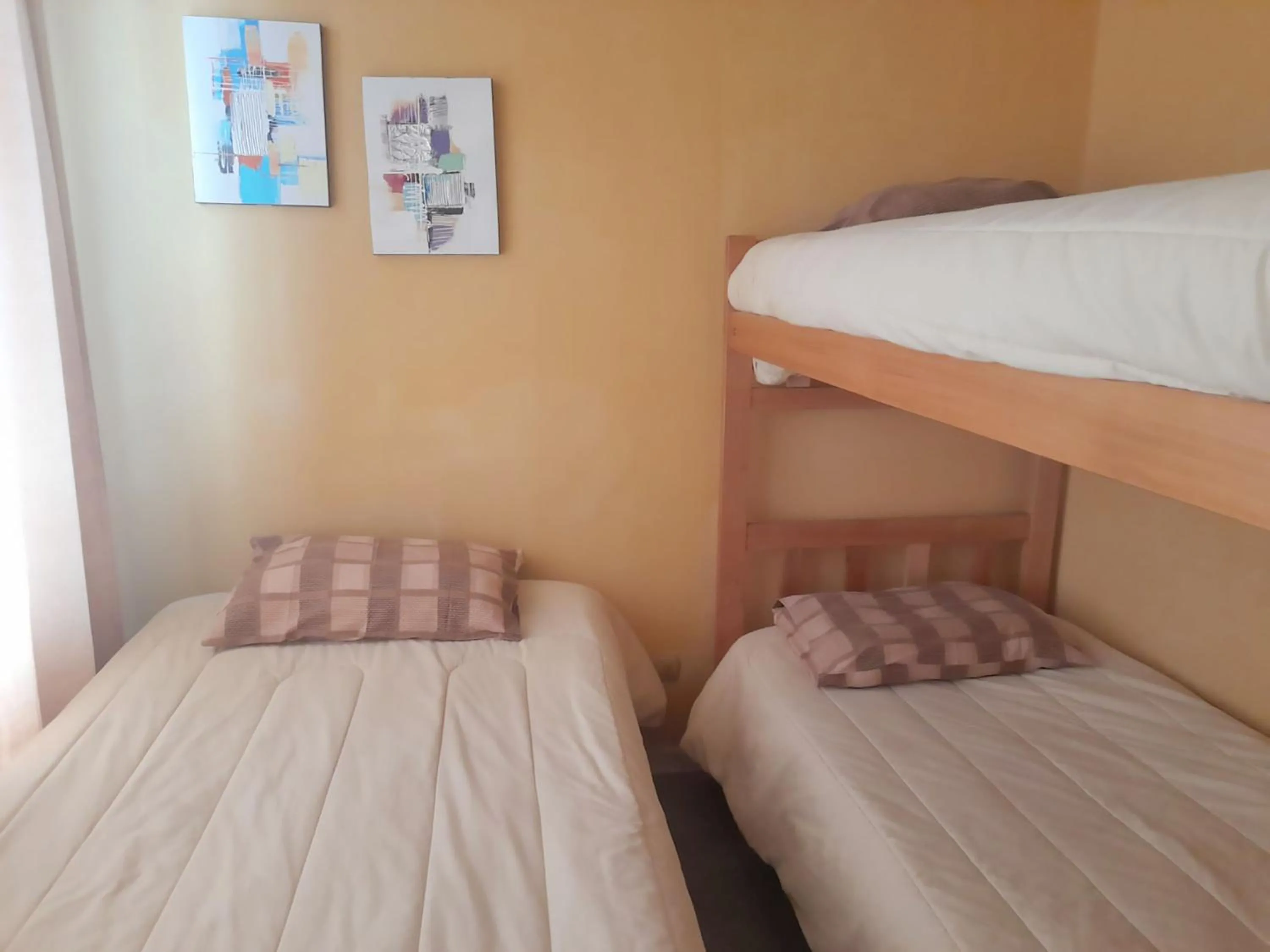 Decorative detail, Bed in VIP Apartments Chile