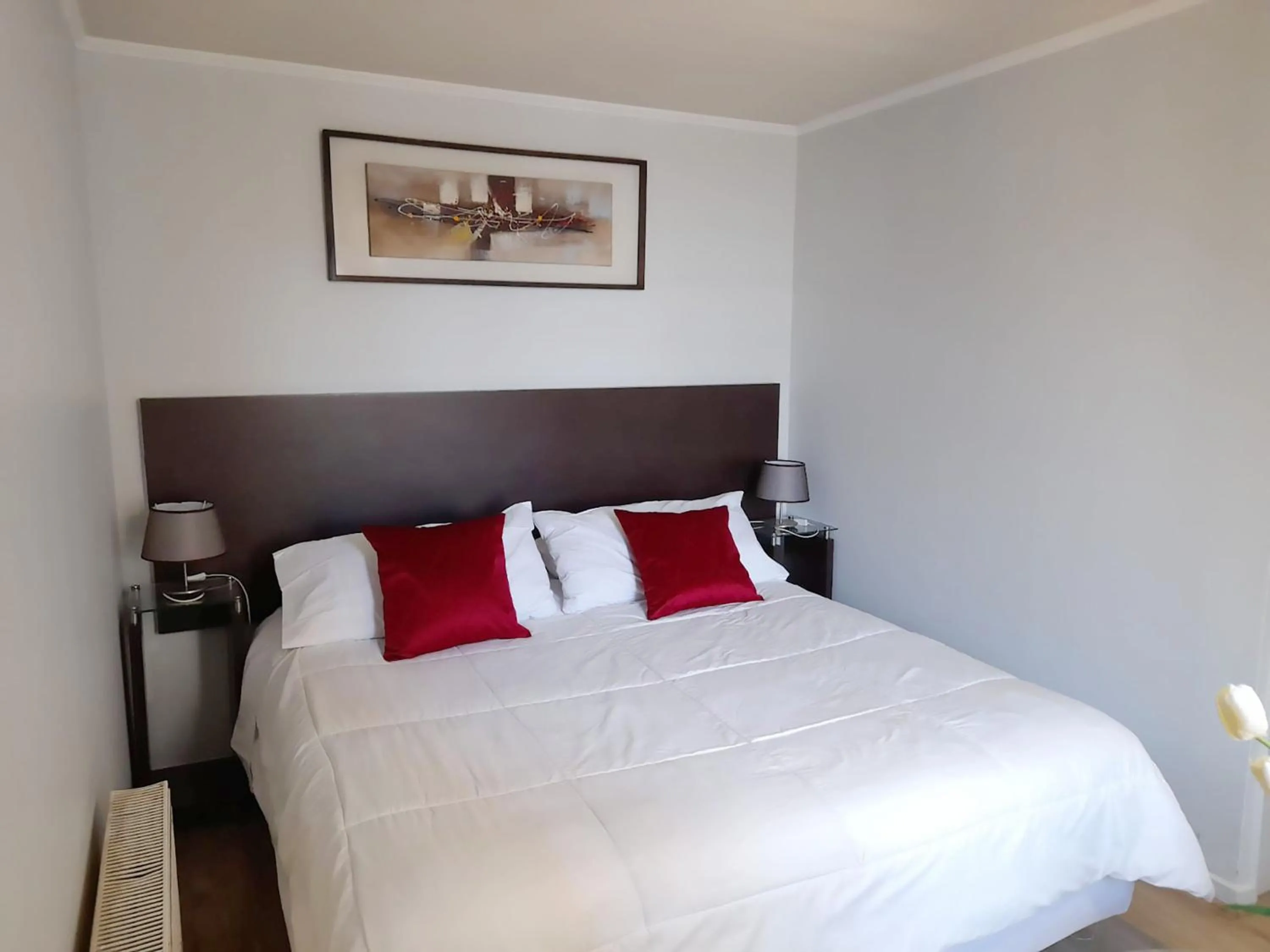 Photo of the whole room, Bed in VIP Apartments Chile