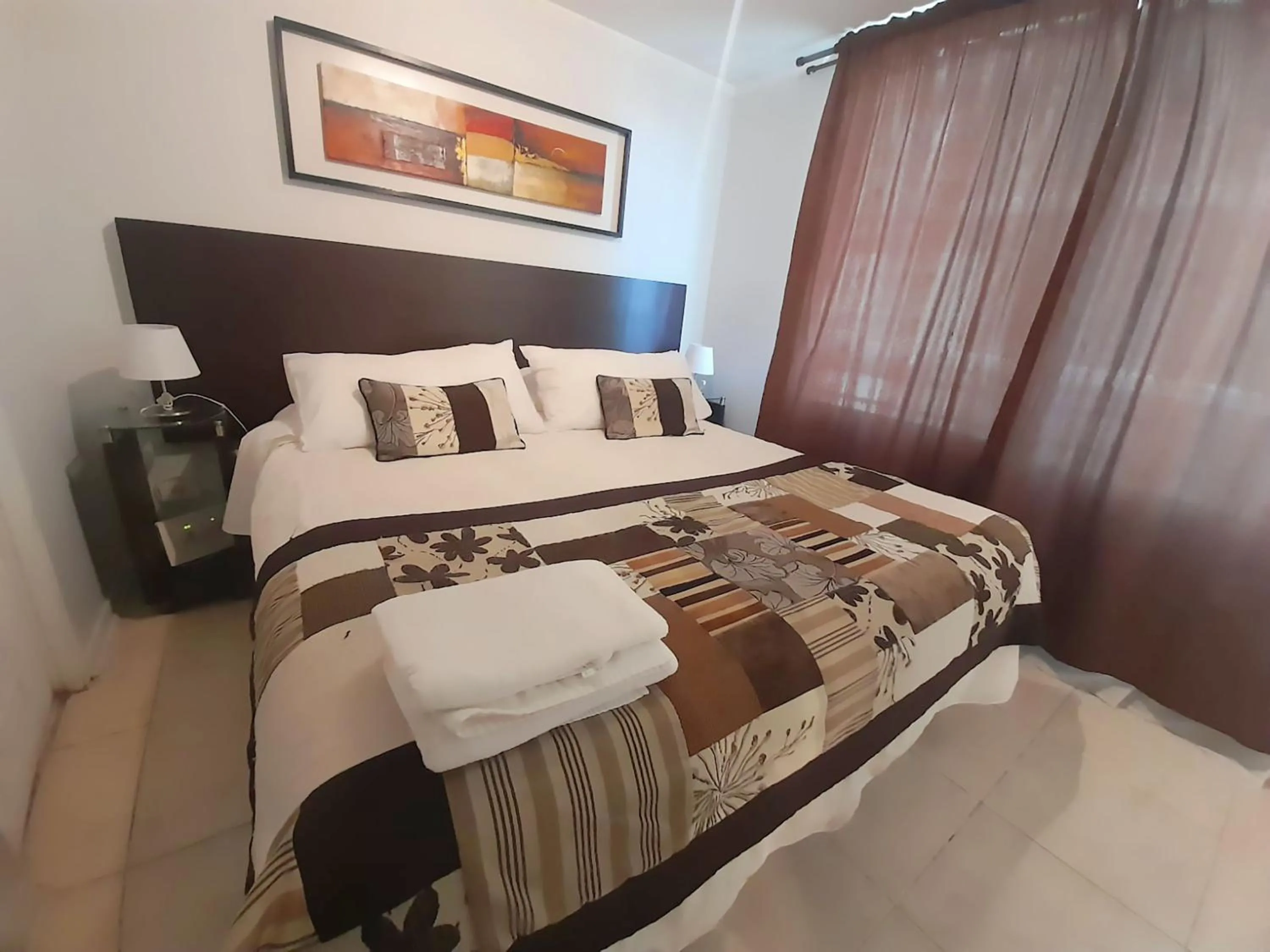 Decorative detail, Bed in VIP Apartments Chile