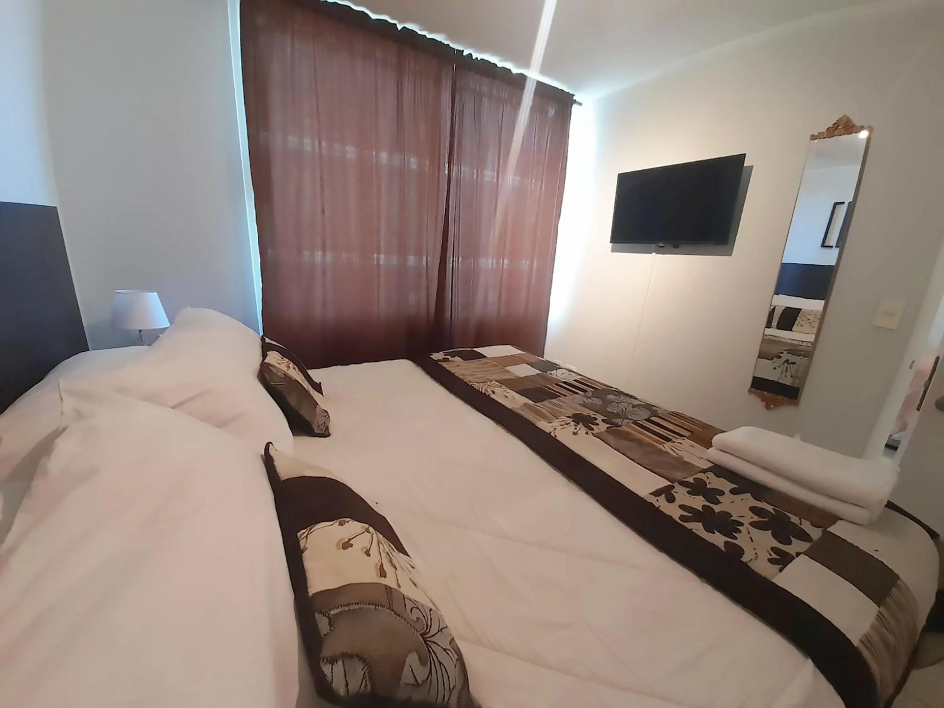 Decorative detail, Bed in VIP Apartments Chile