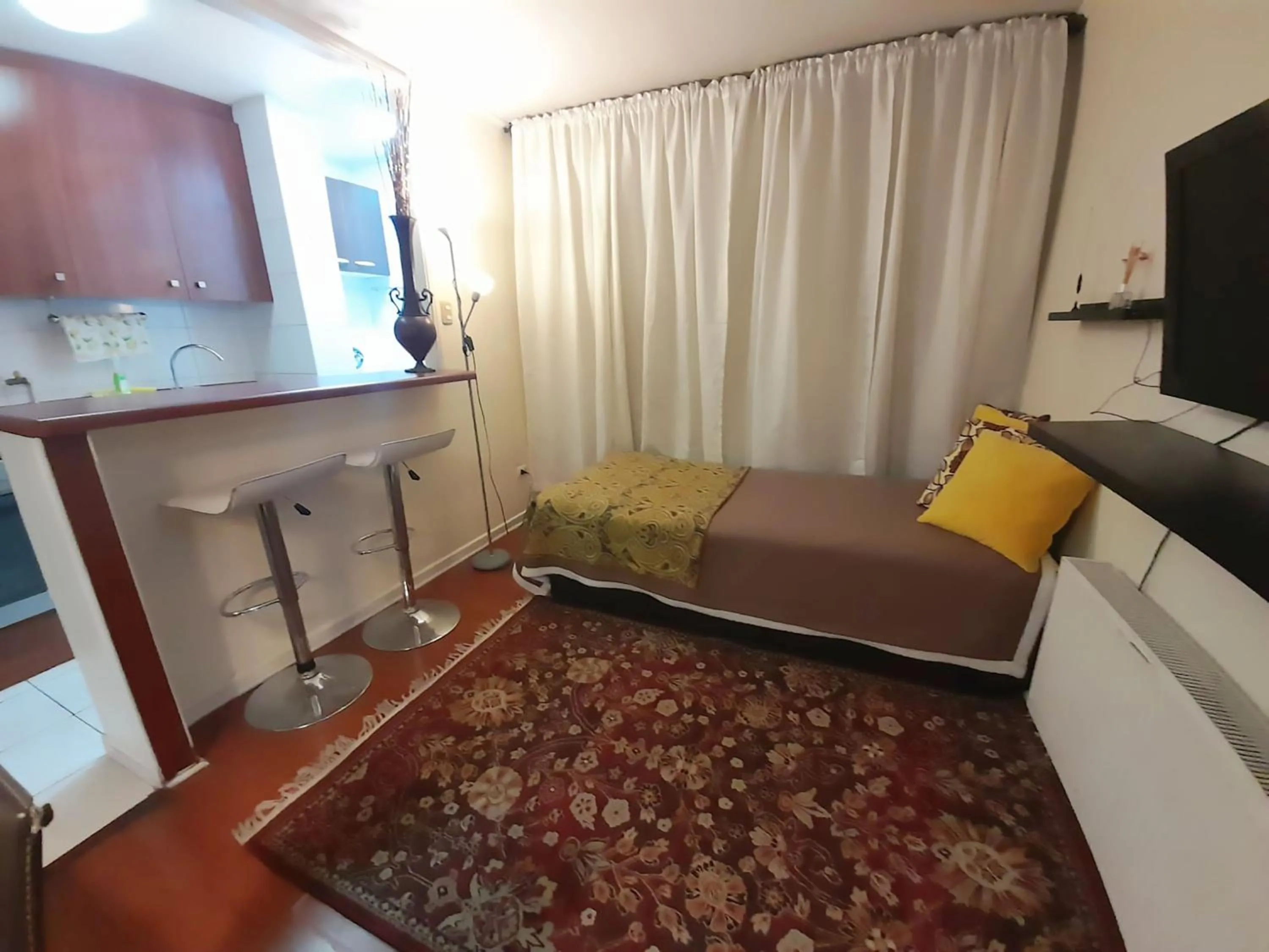 Seating area, Bed in VIP Apartments Chile