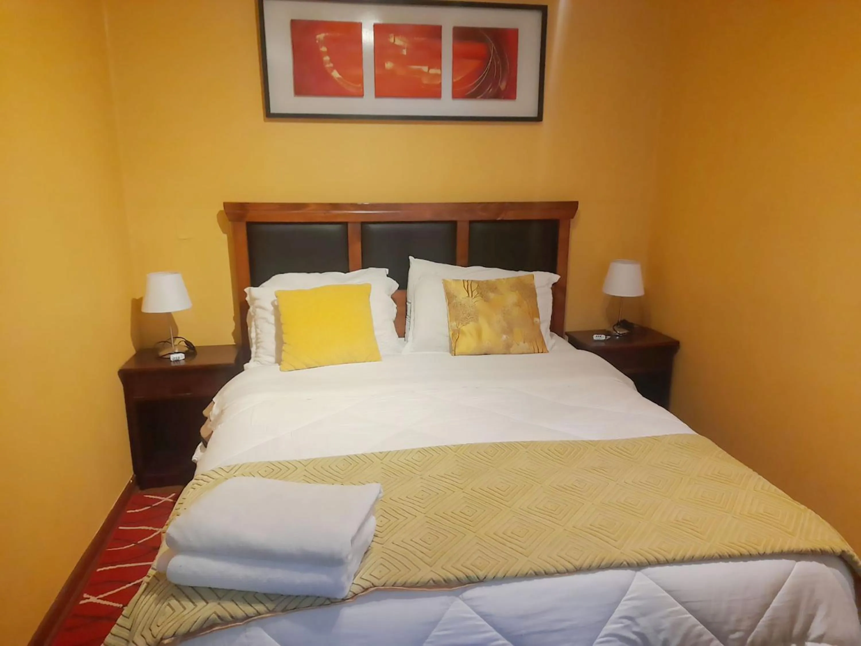 Decorative detail, Bed in VIP Apartments Chile