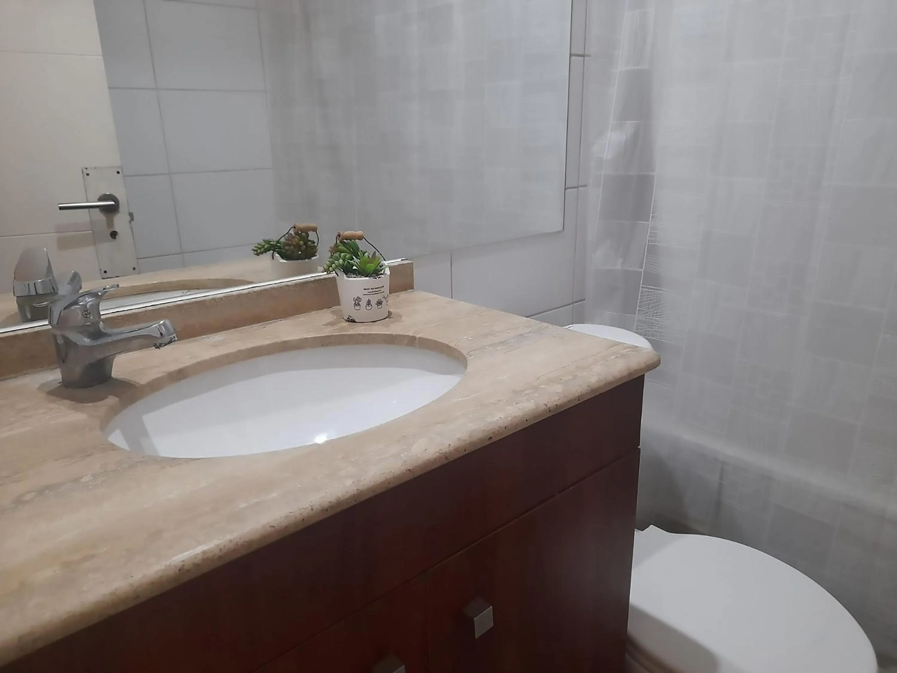 Bathroom in VIP Apartments Chile