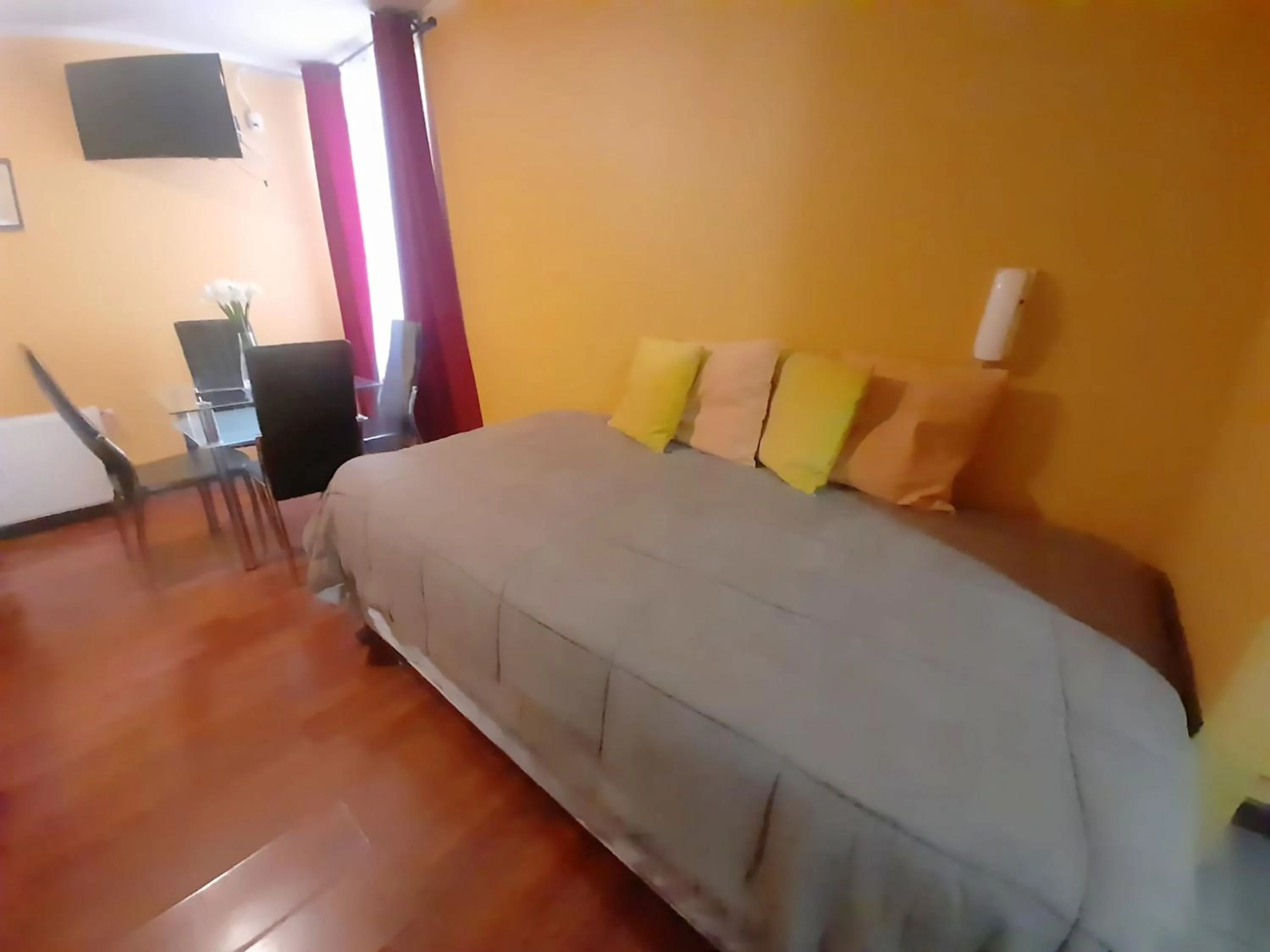 Seating area, Bed in VIP Apartments Chile