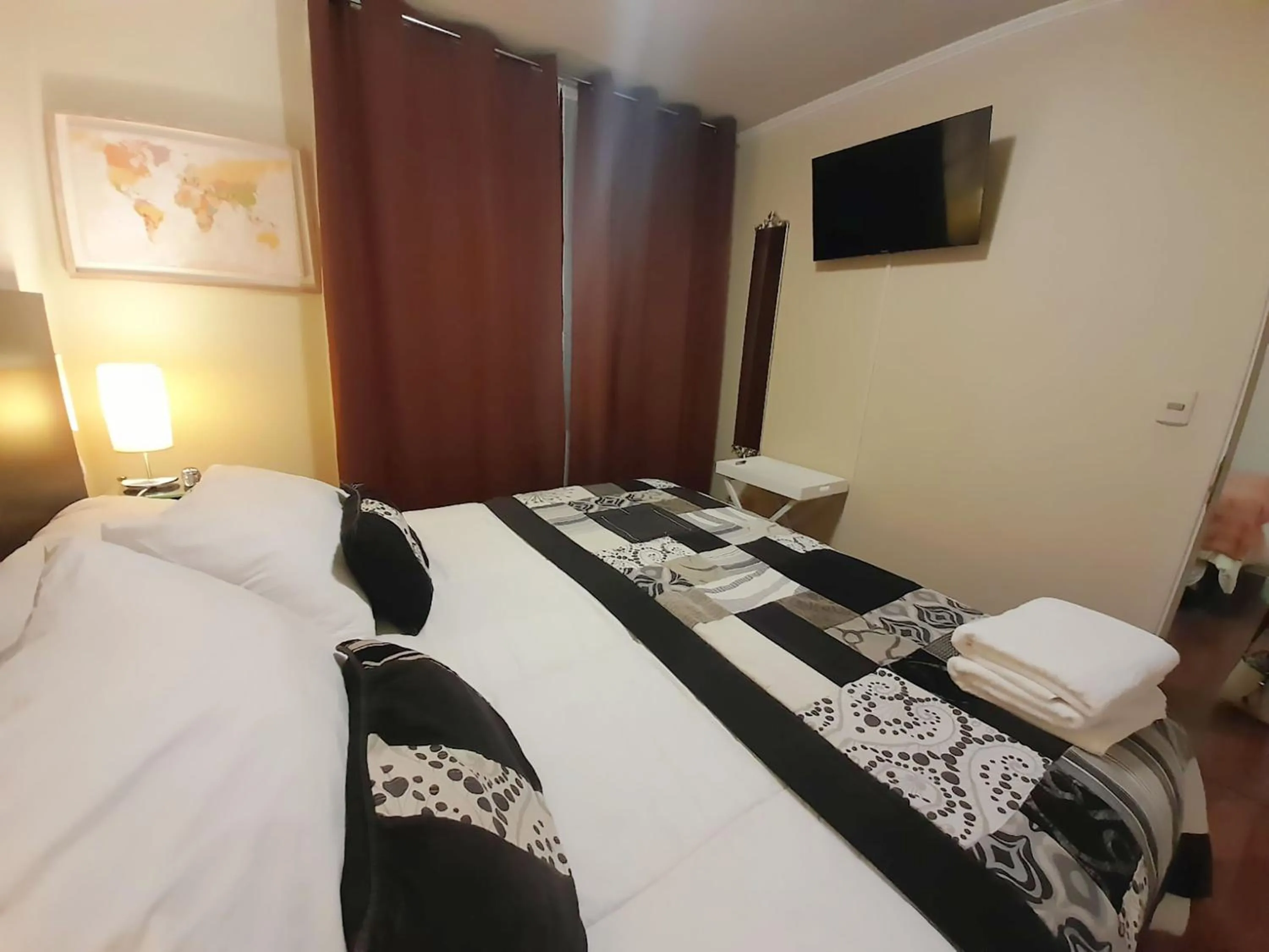 Decorative detail, Bed in VIP Apartments Chile