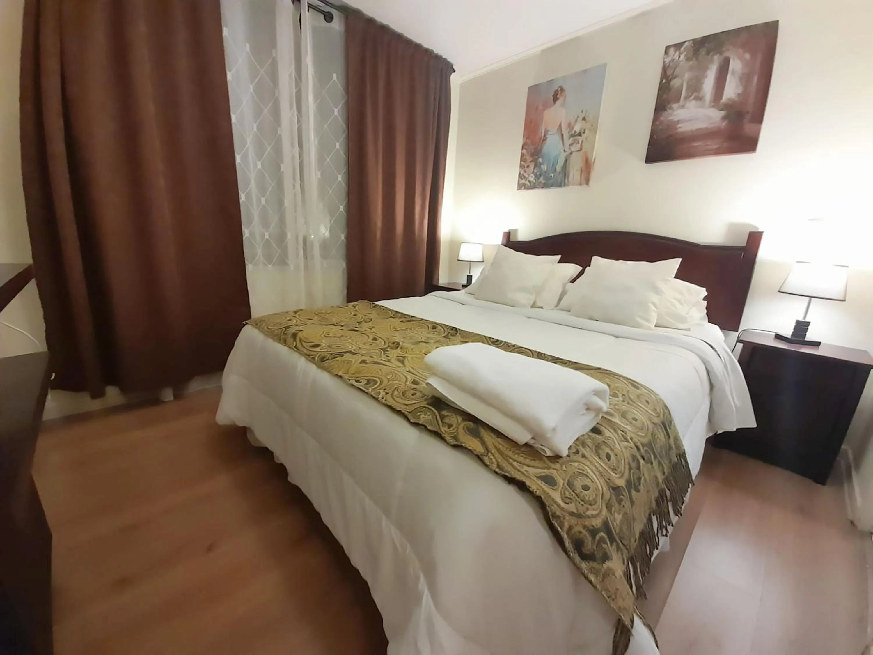 Decorative detail, Bed in VIP Apartments Chile