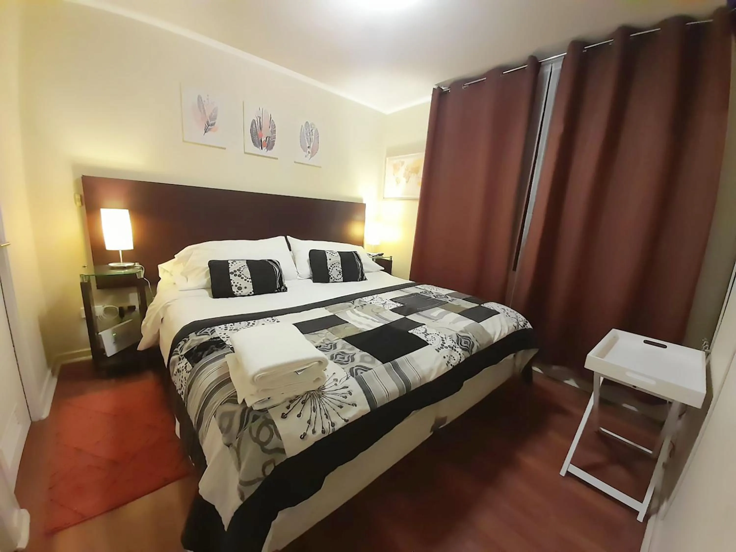 Decorative detail, Bed in VIP Apartments Chile