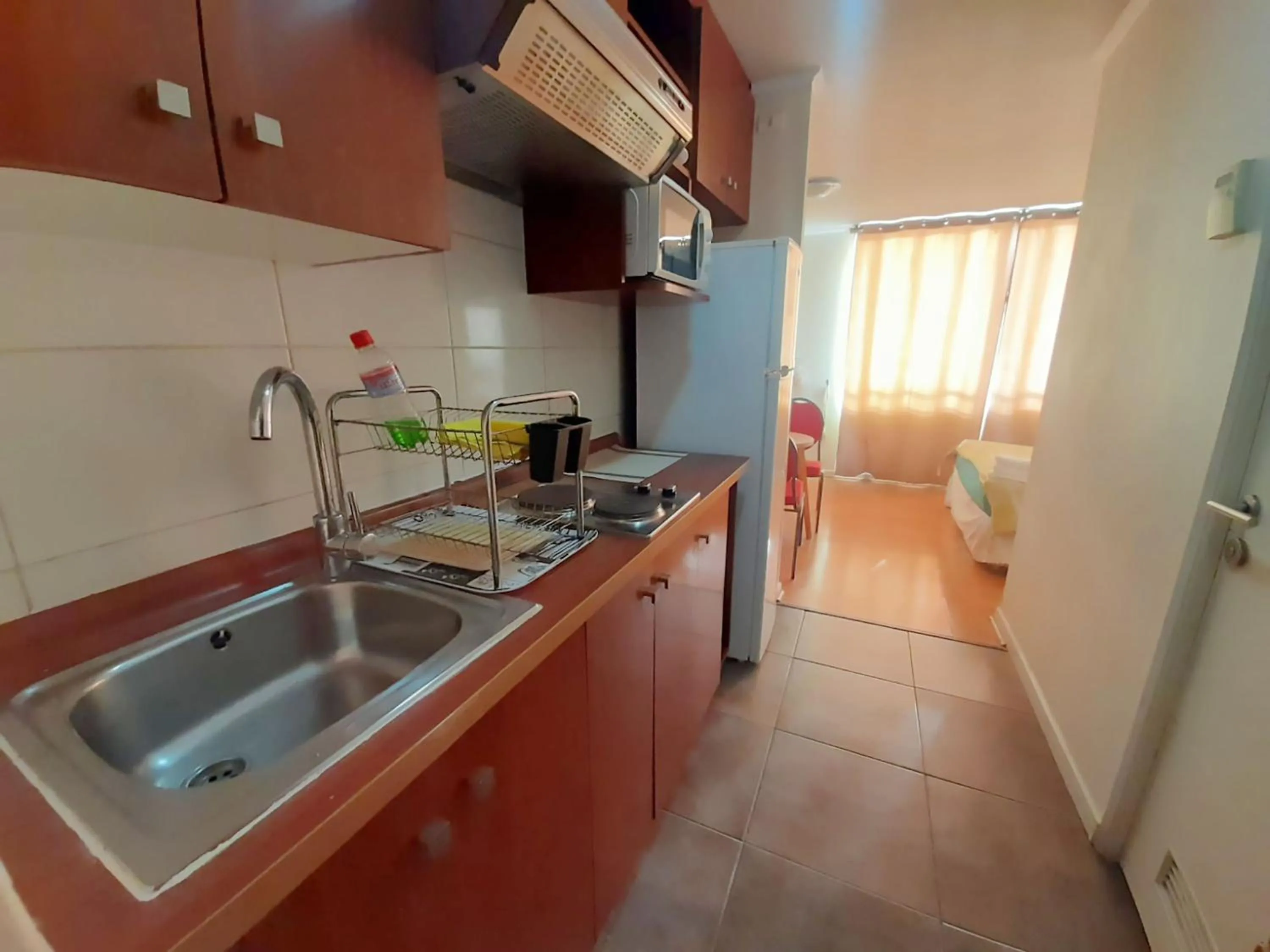 Kitchen or kitchenette in VIP Apartments Chile