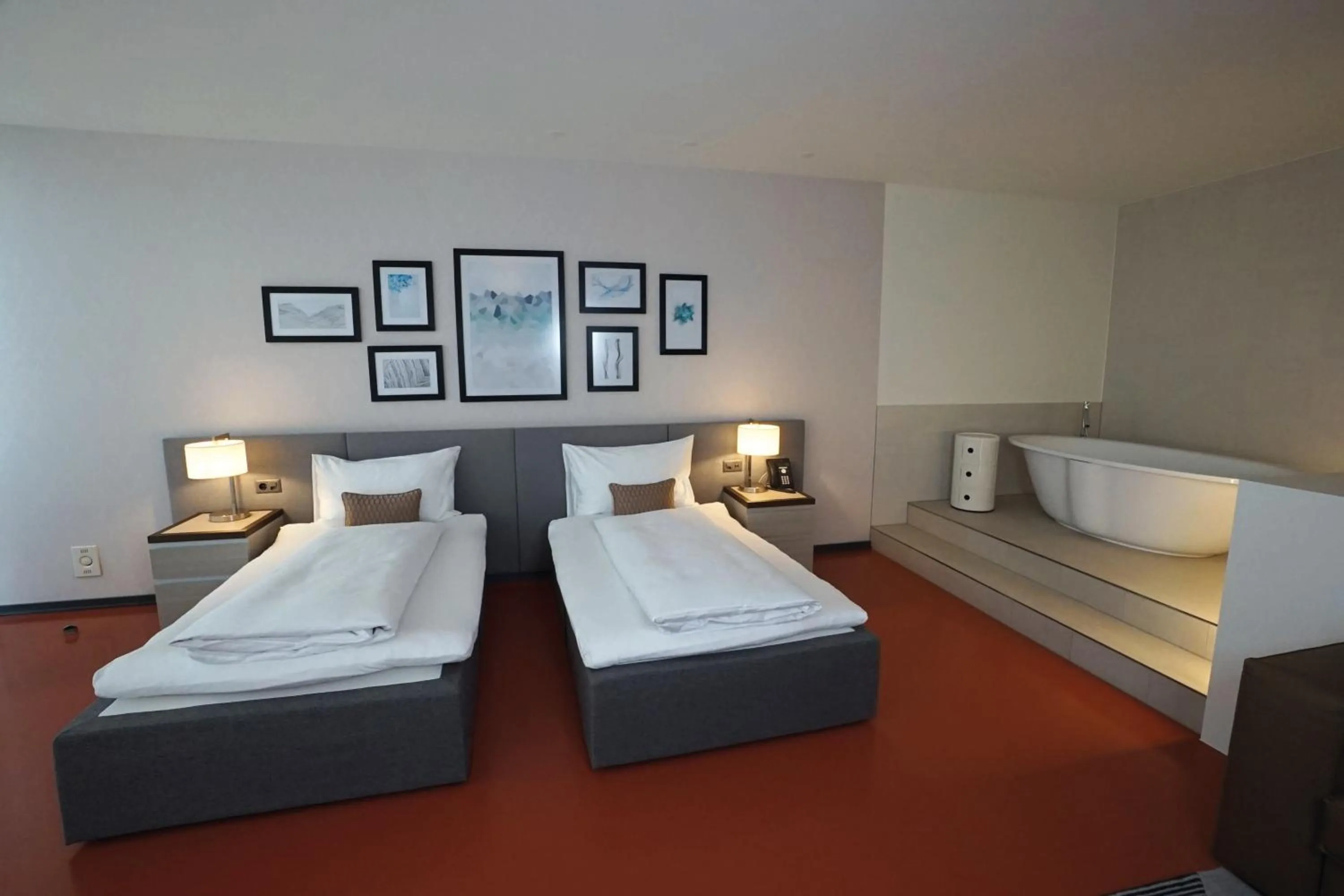 Bathroom, Bed in Hotel Sempachersee