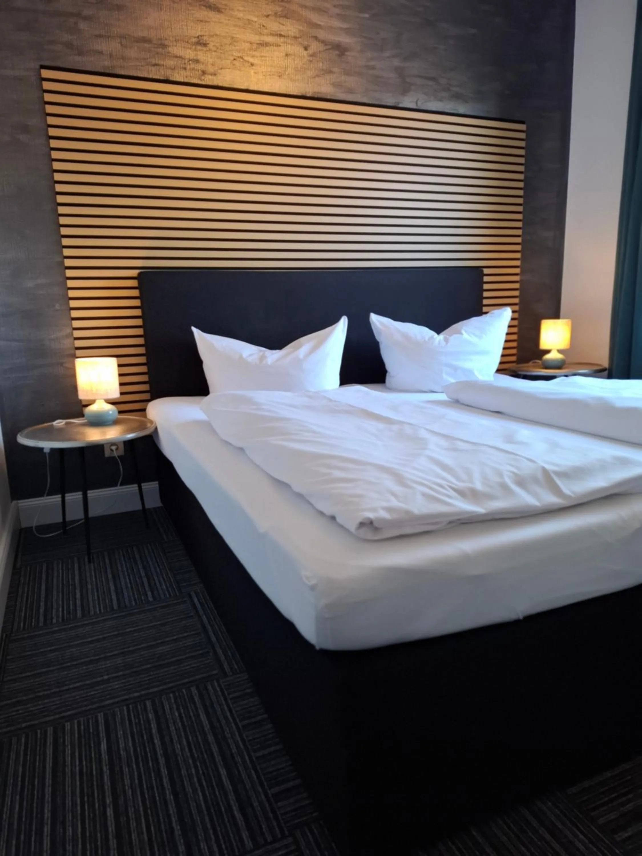 Photo of the whole room, Bed in Hotel Am Schwarzen Berg