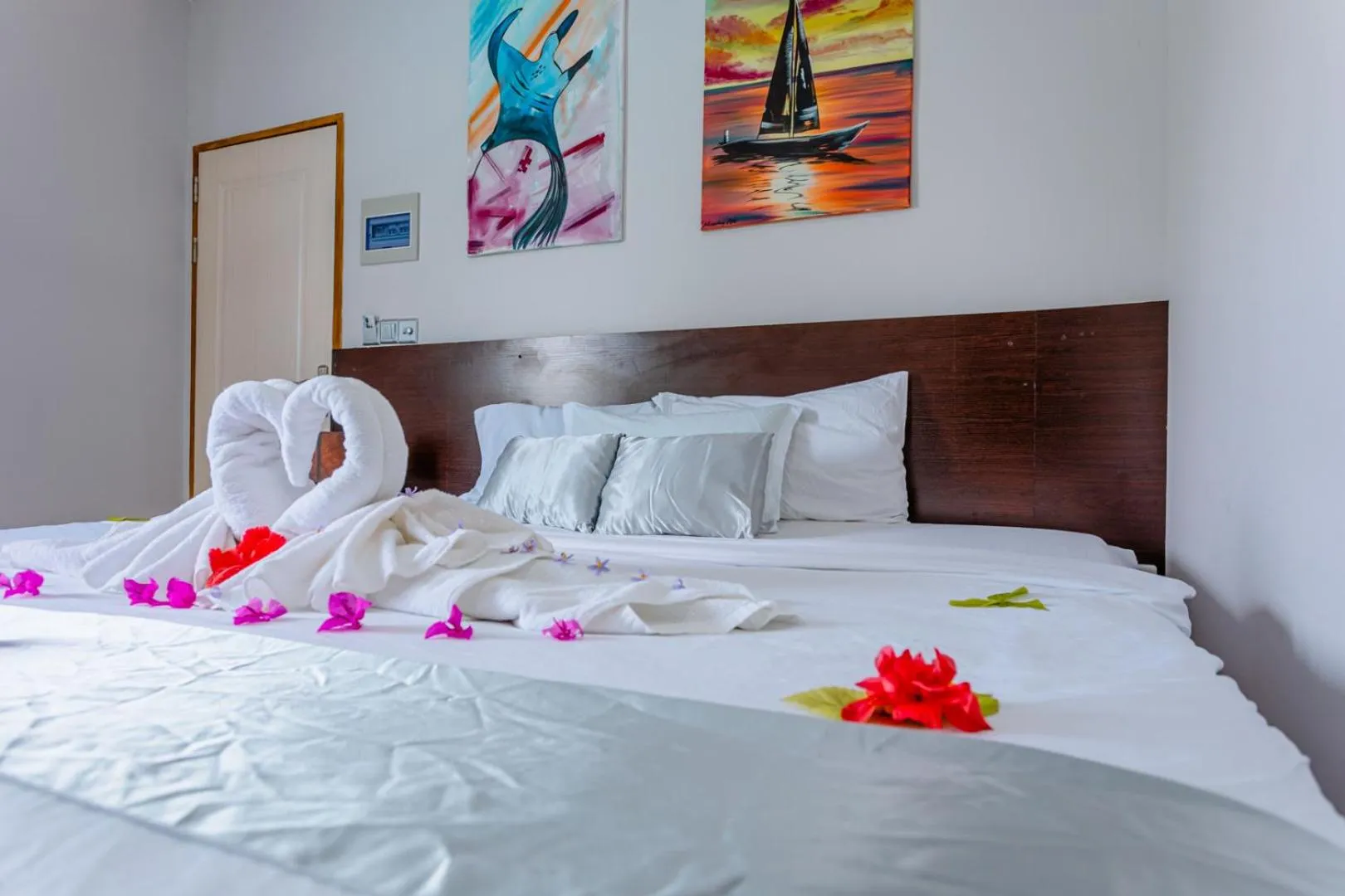 Bed in Violet Inn Hotel