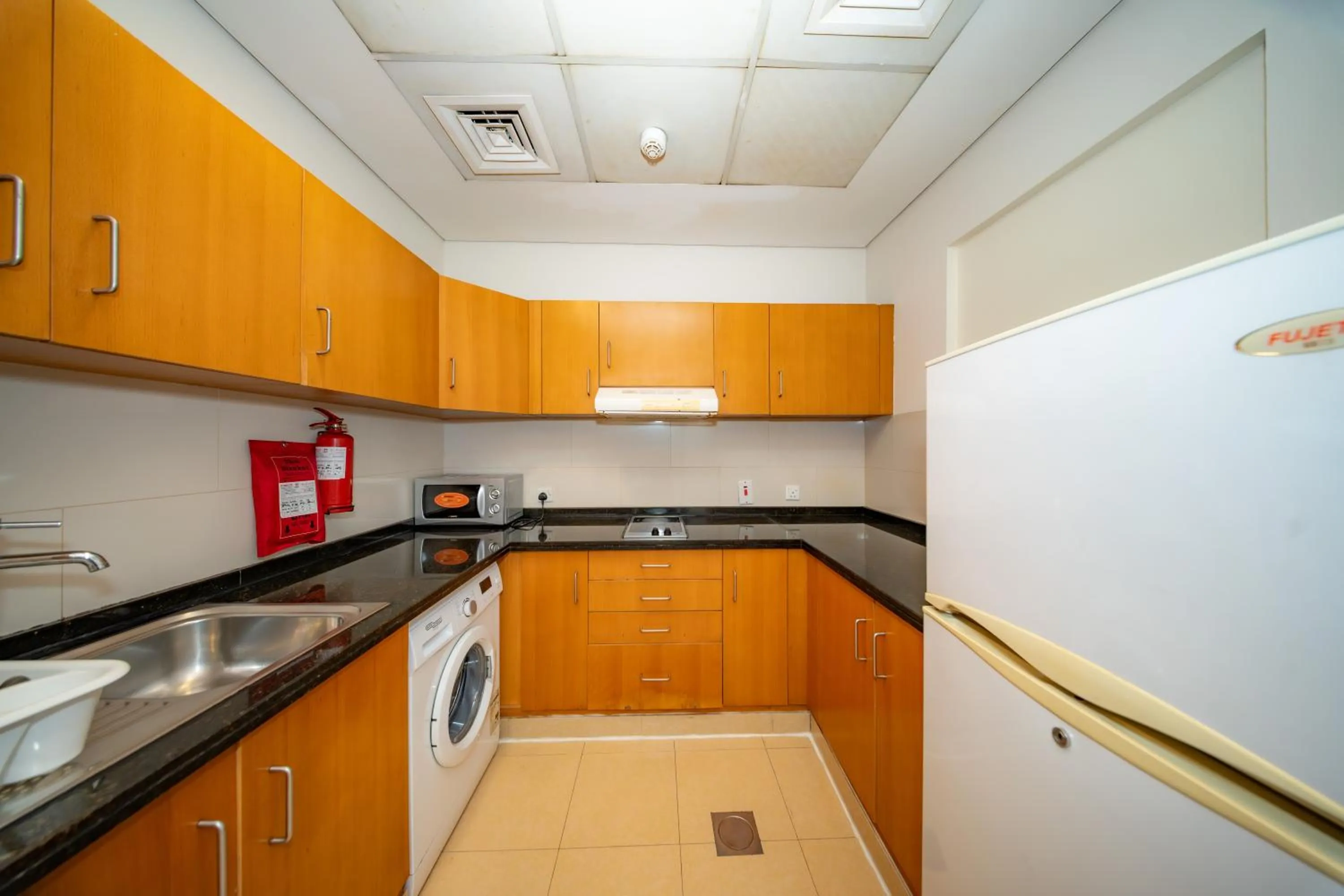 Kitchen or kitchenette in City Stay Grand Hotel Apartments - Al Barsha