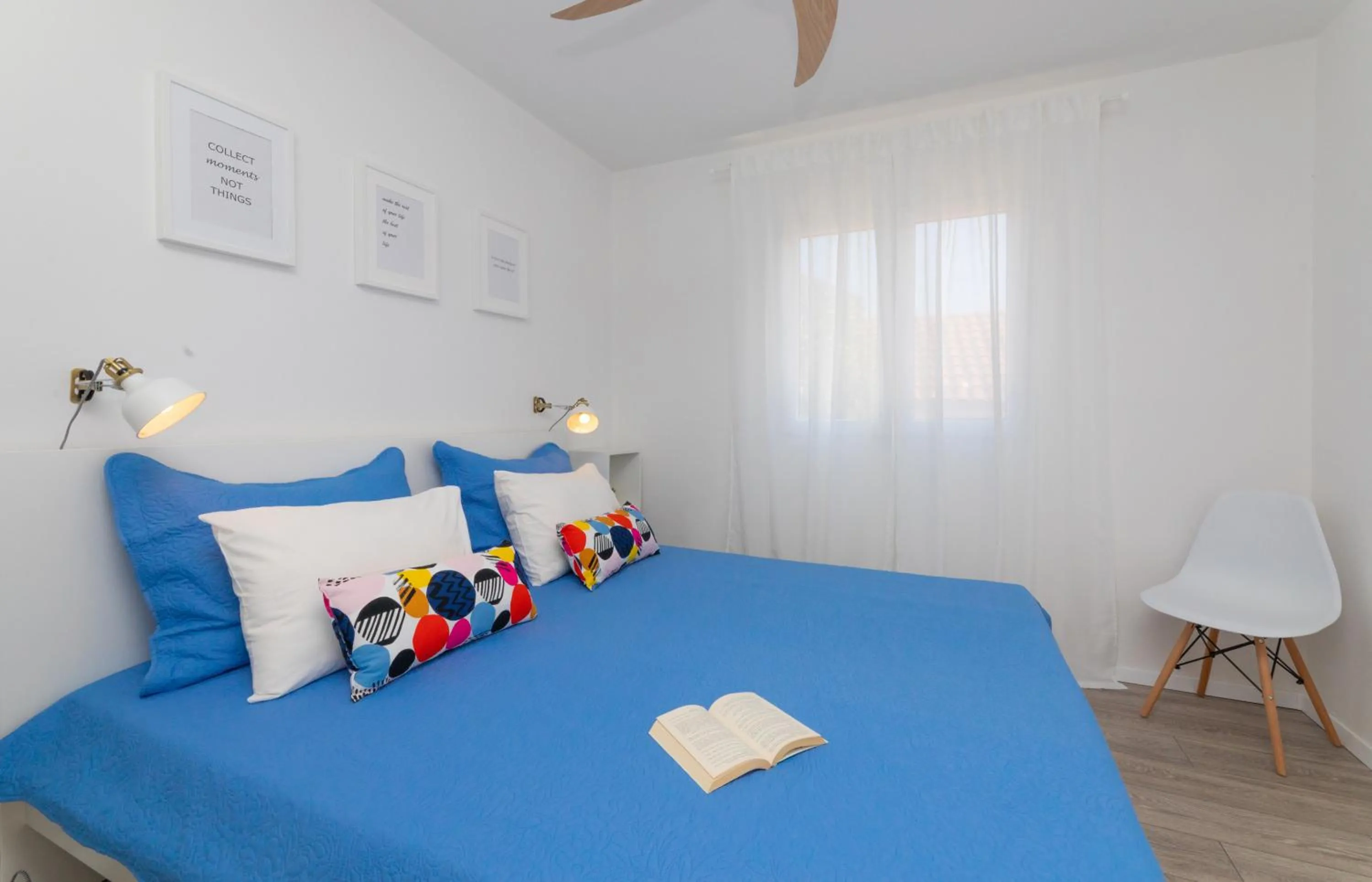 Bed in Two Flowers Luxury Apartment