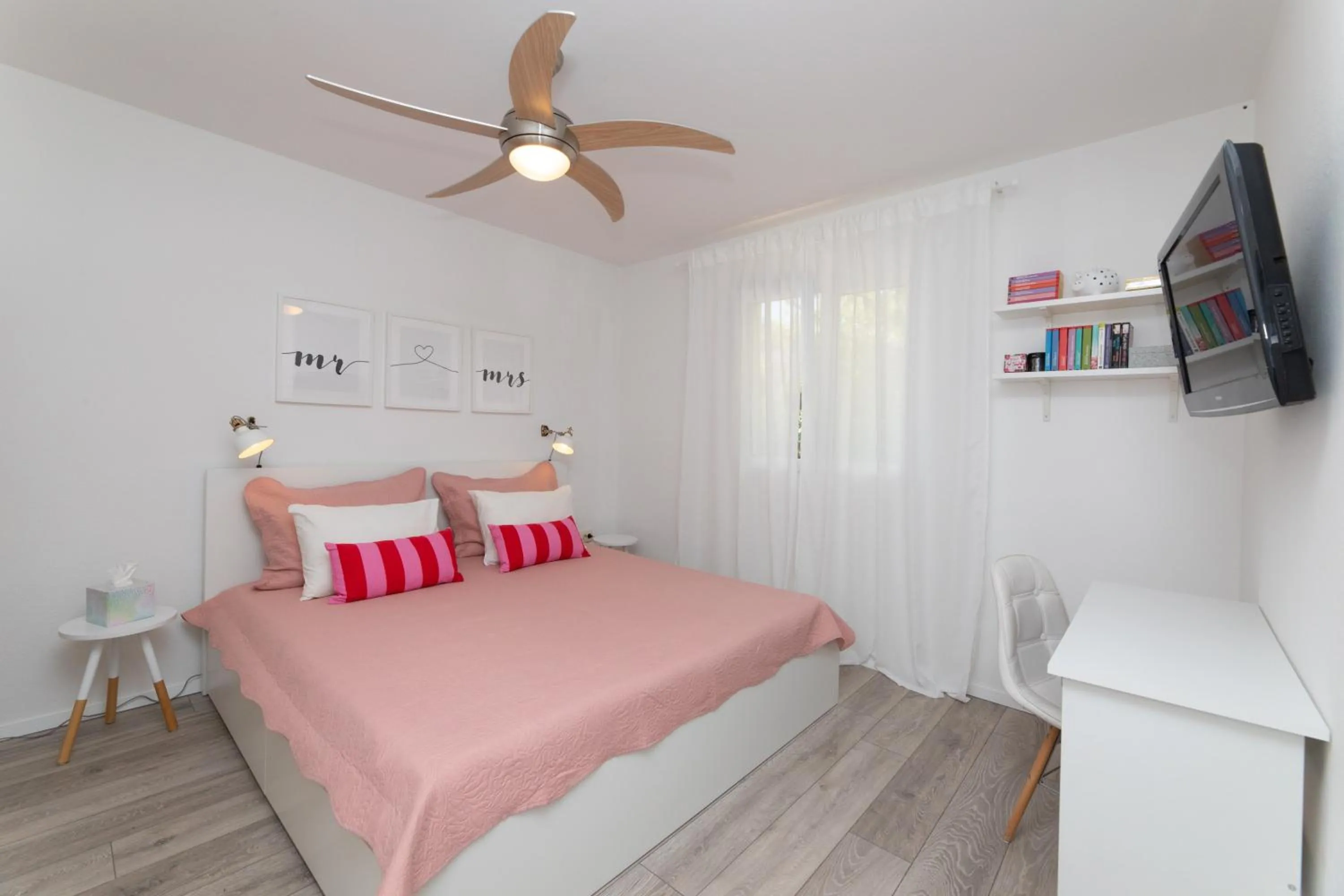 Bed in Two Flowers Luxury Apartment