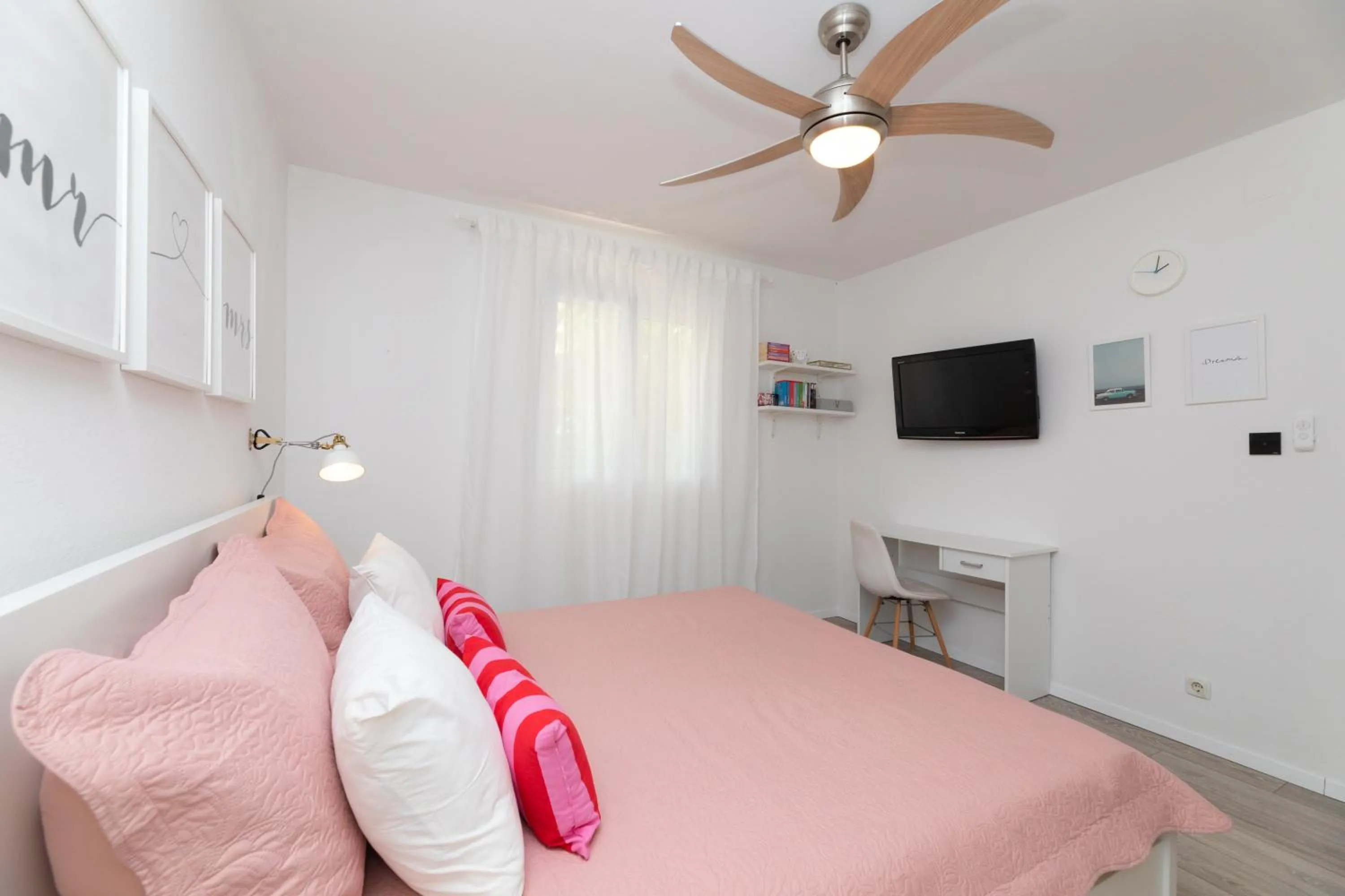 Bed in Two Flowers Luxury Apartment