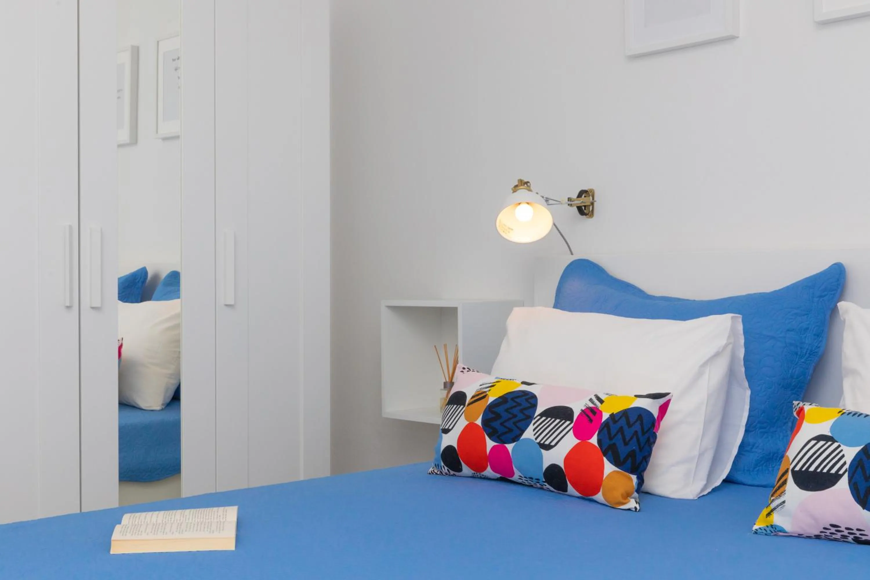 Bed in Two Flowers Luxury Apartment