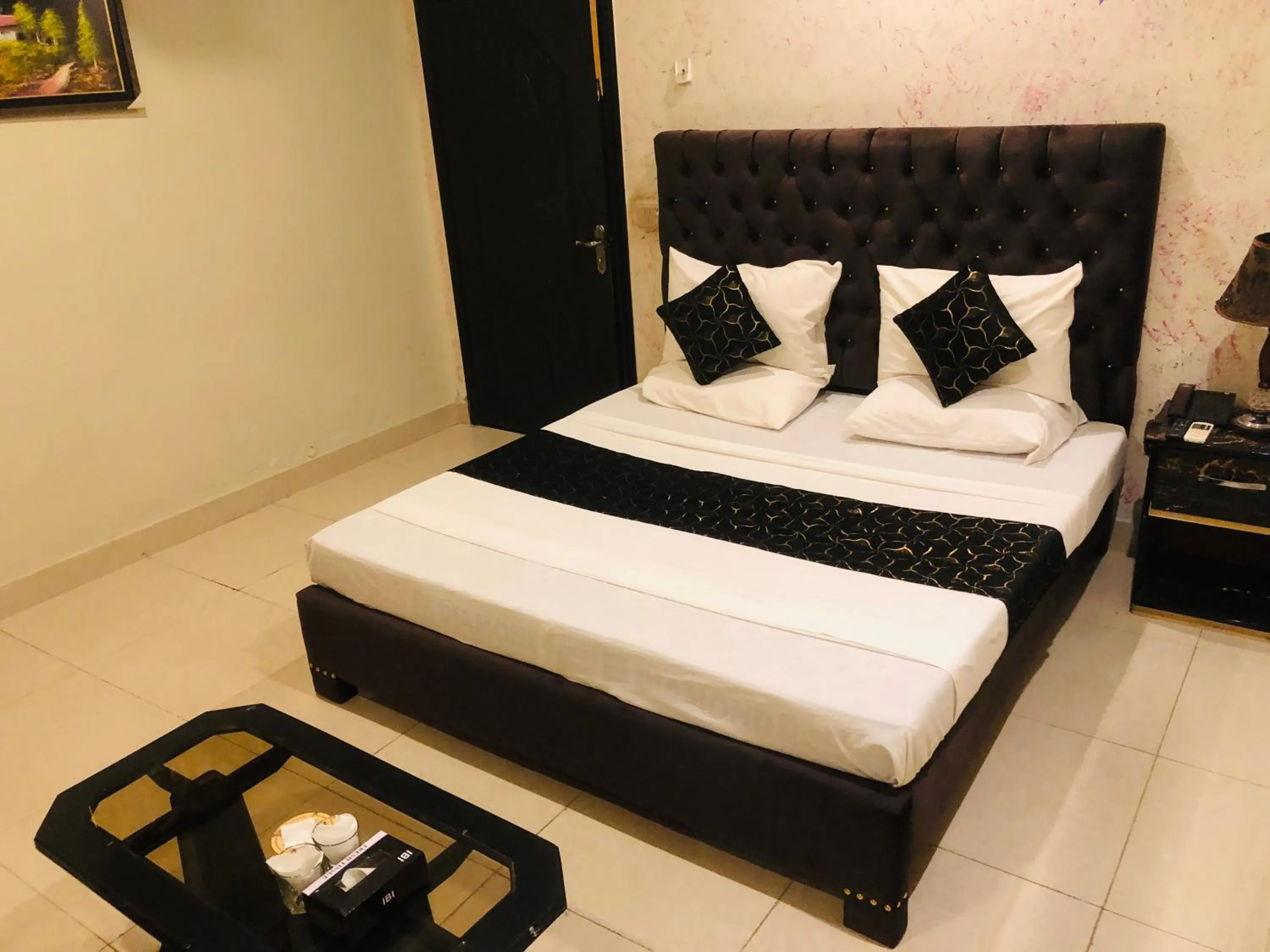 Bed in Hotel Tulip Inn