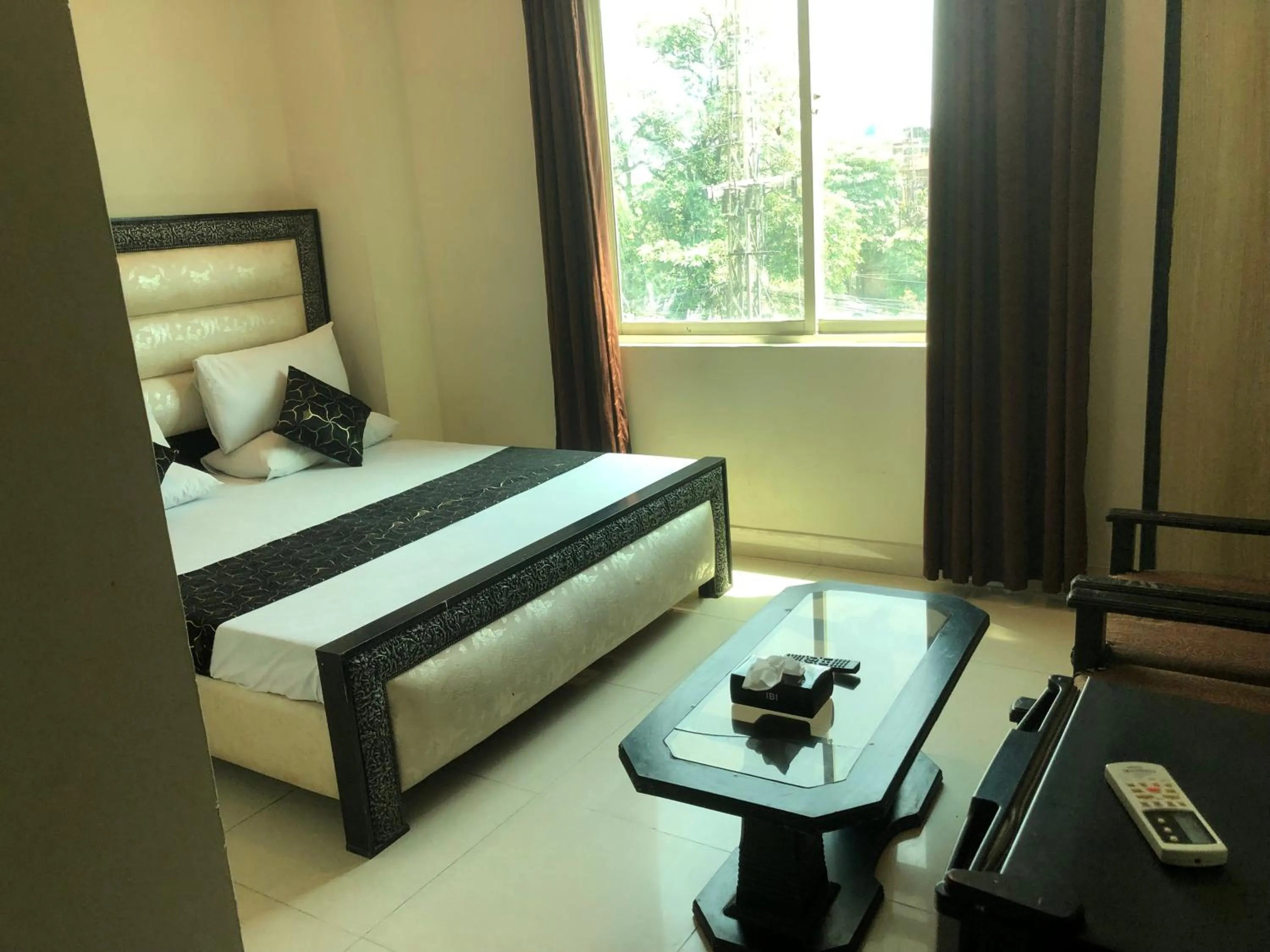 Bed in Hotel Tulip Inn