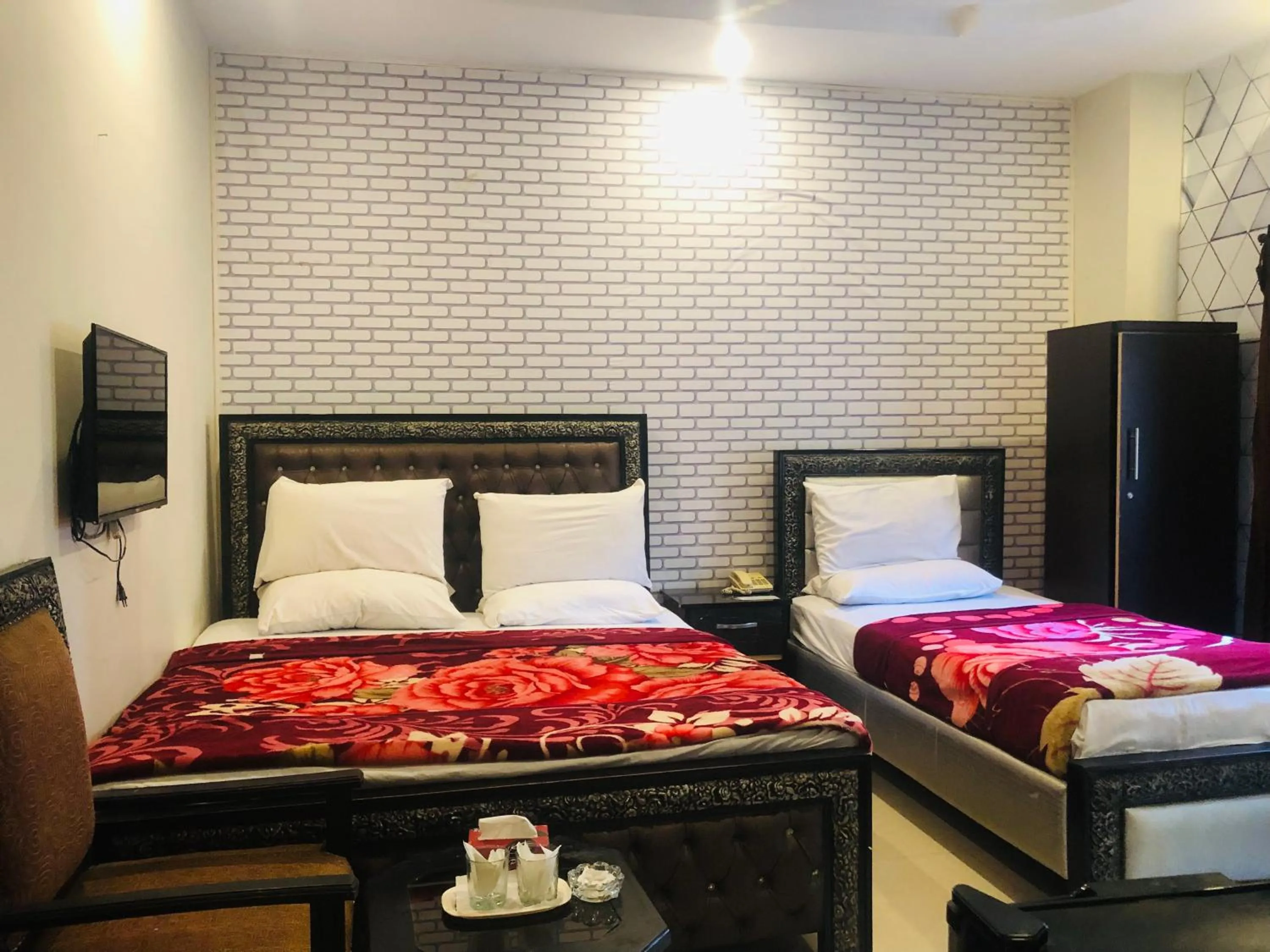 Bed in Hotel Tulip Inn