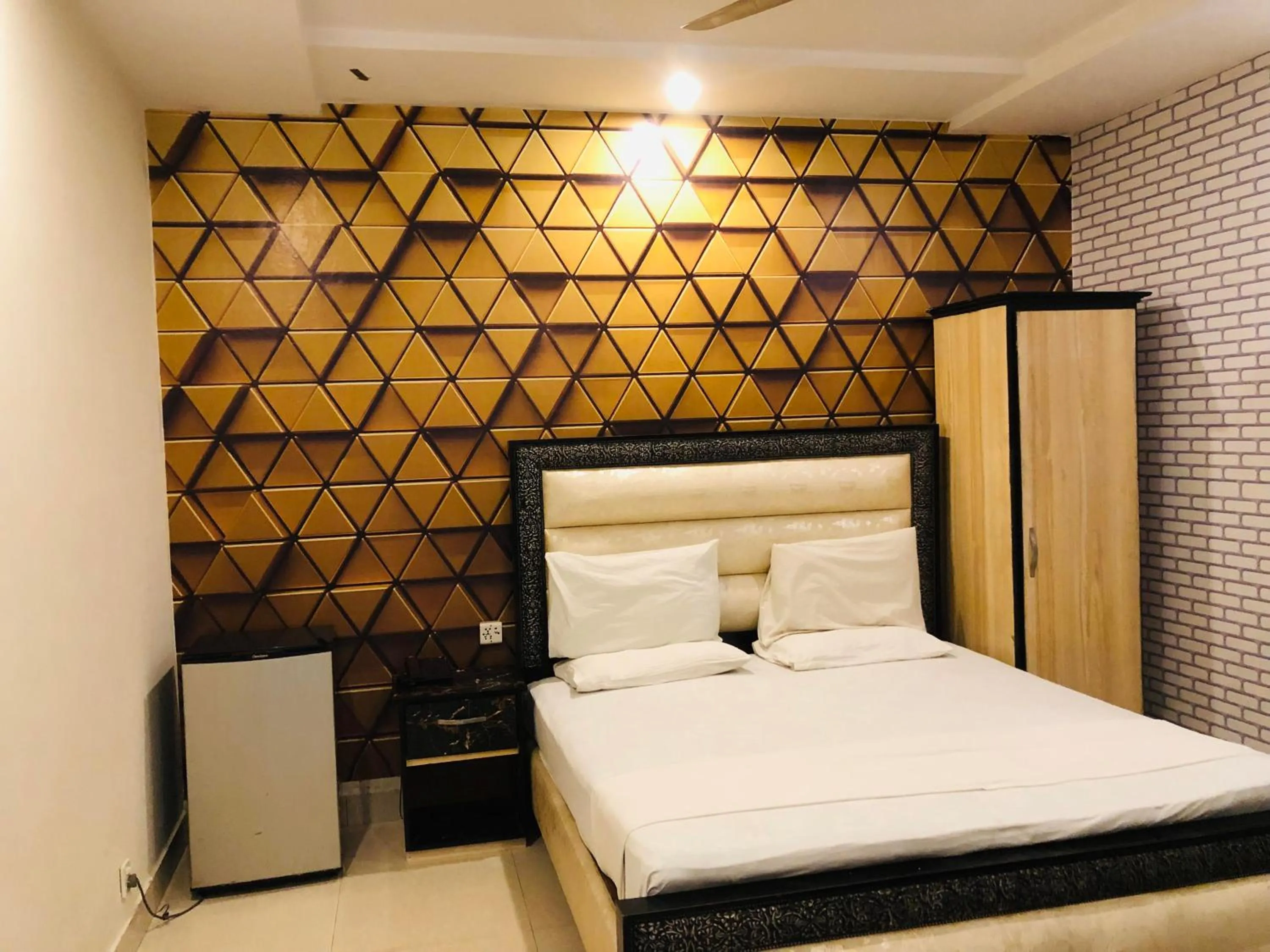 Bed in Hotel Tulip Inn