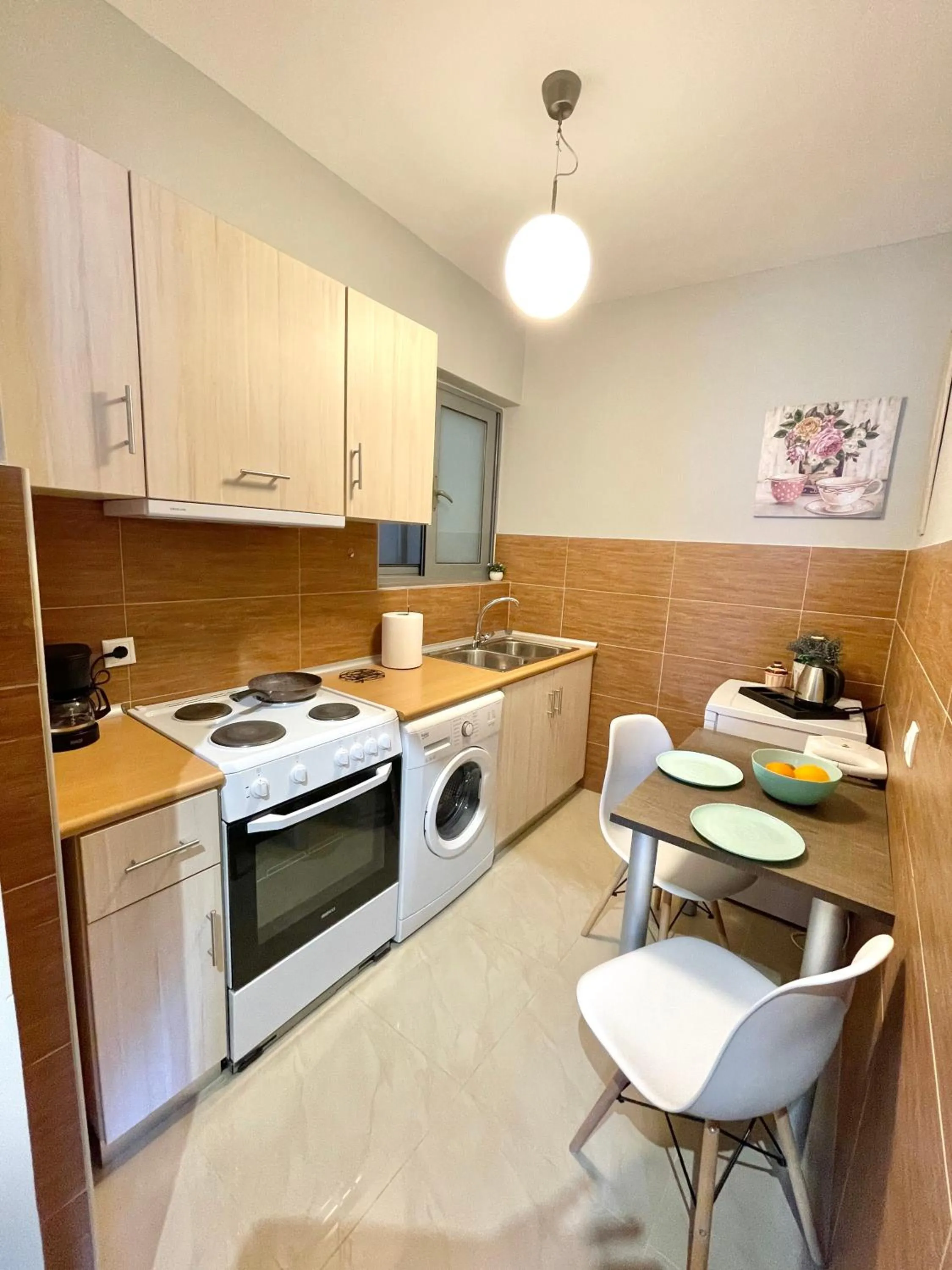Kitchen or kitchenette in Melenia Suites