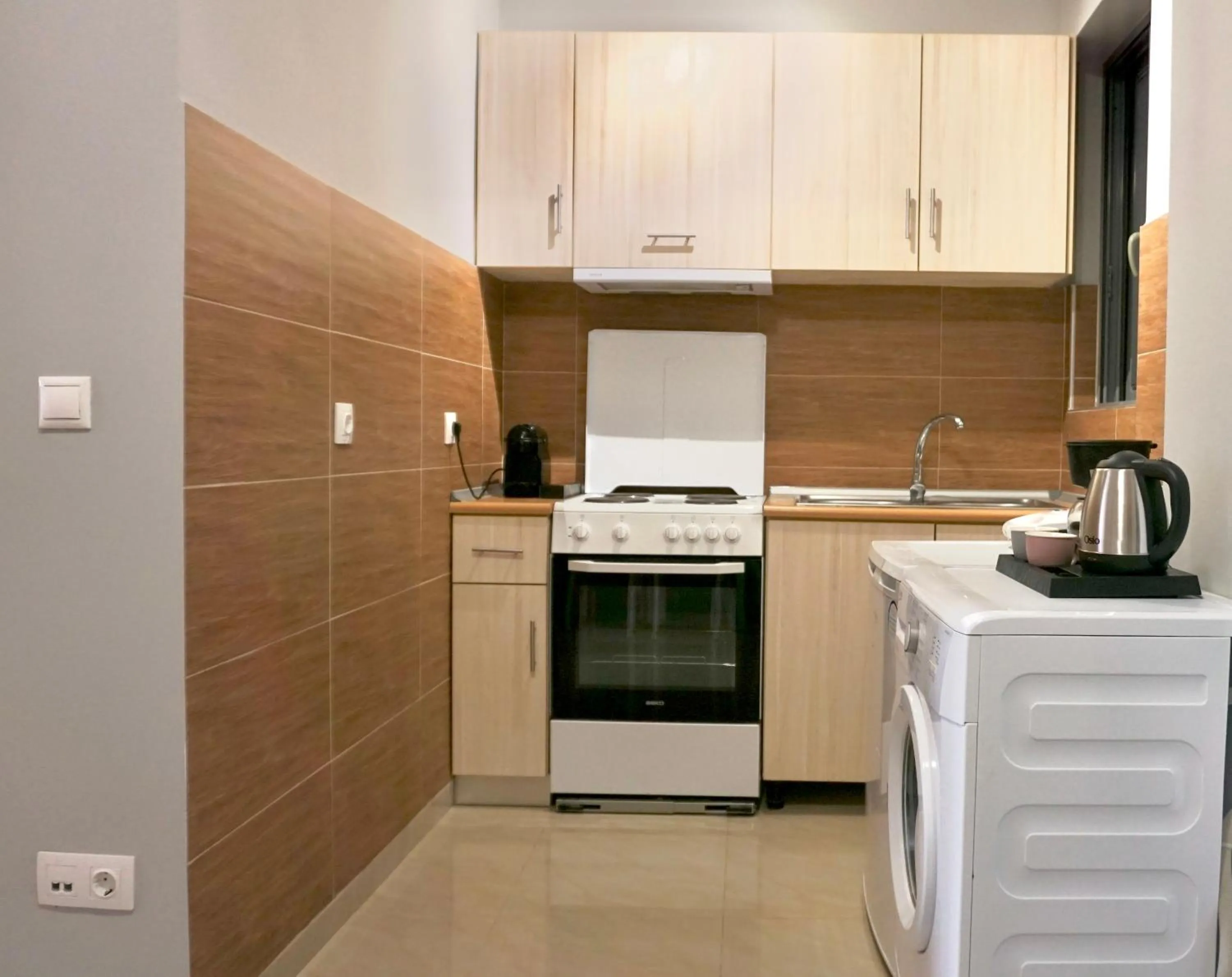 Kitchen or kitchenette in Melenia Suites
