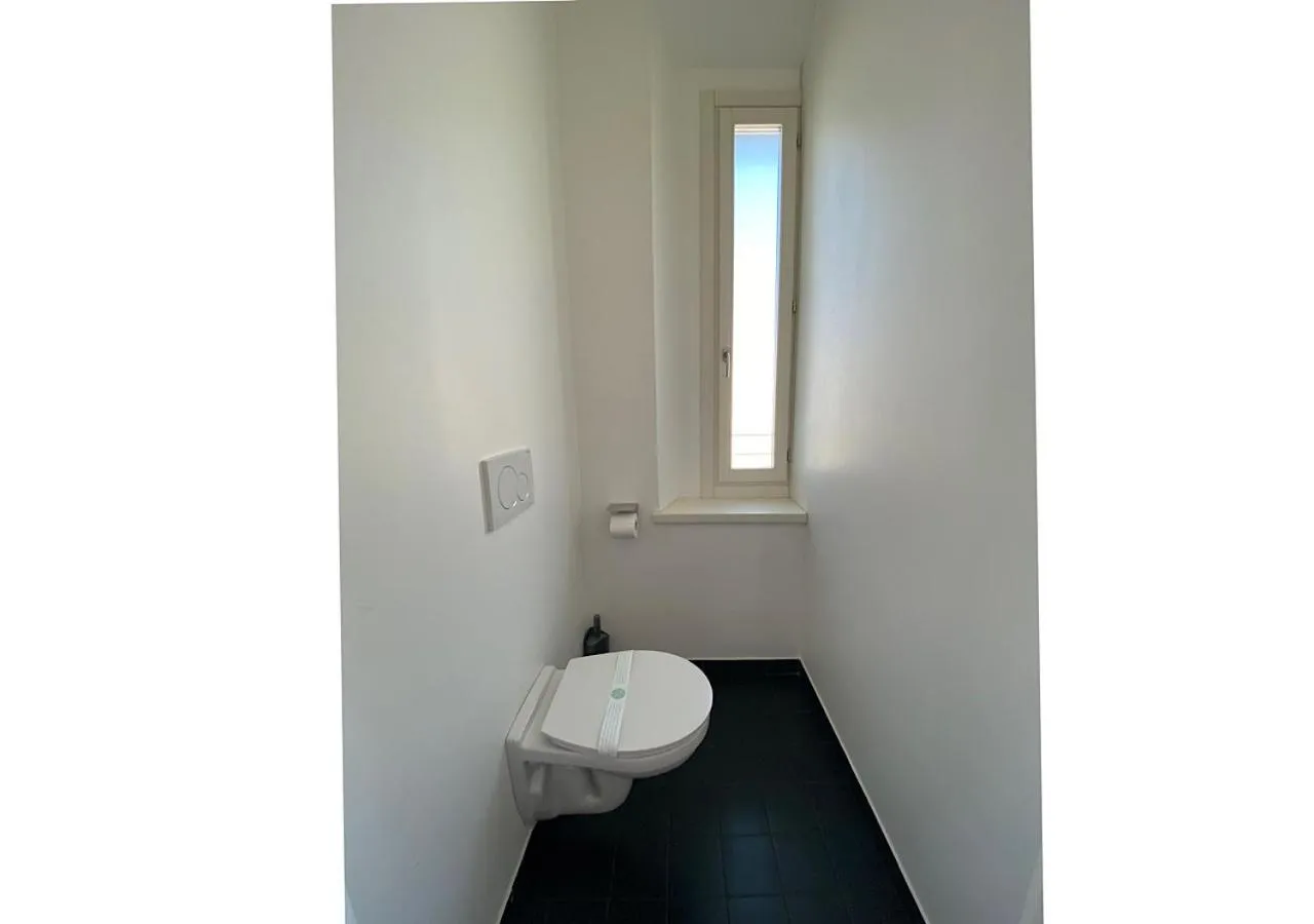 Bathroom in BRIBANO HOSTEL & bike sharing-workers and tourists hospitality